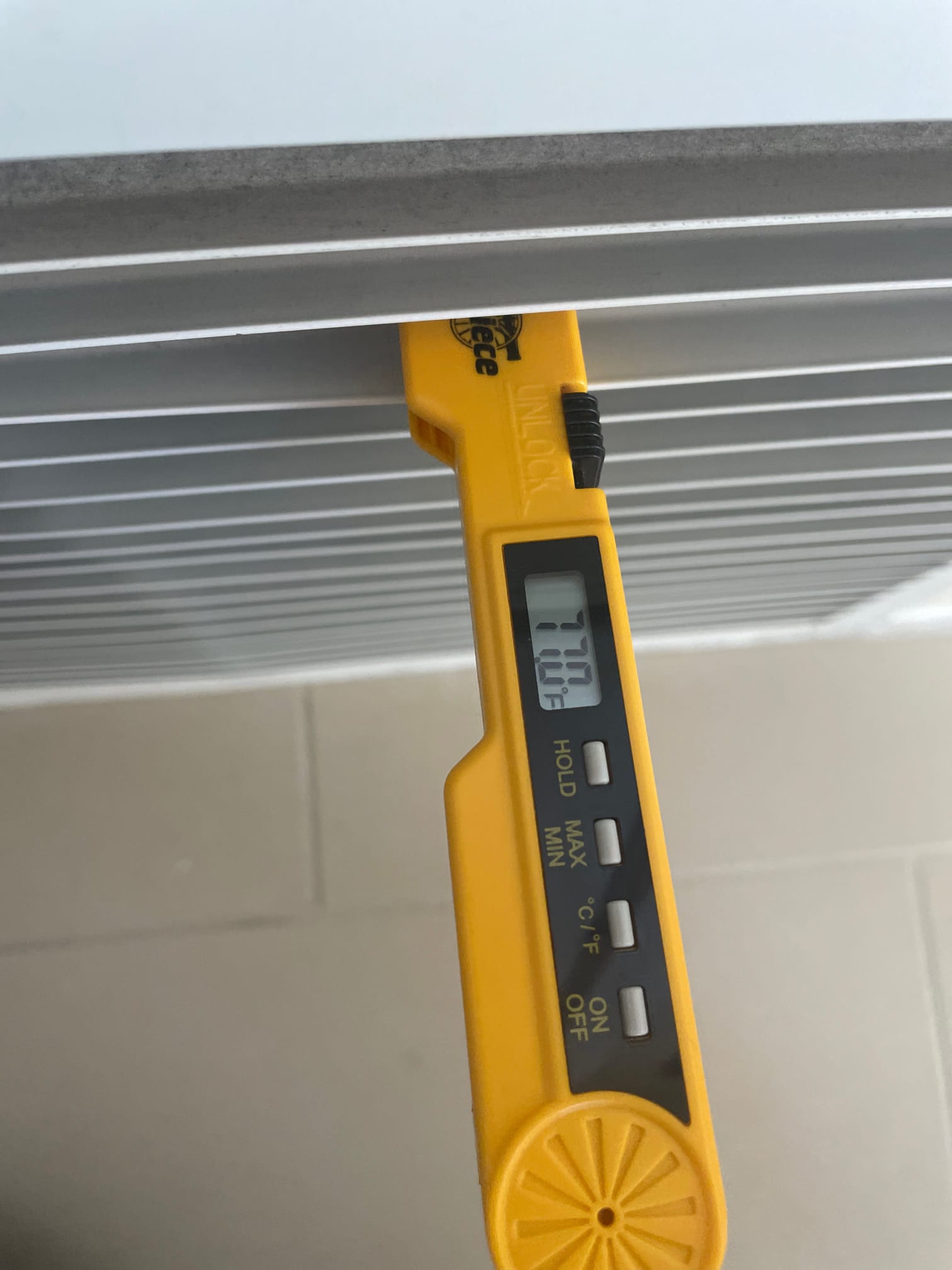 Diagnostic instrument display shows 70 °C.