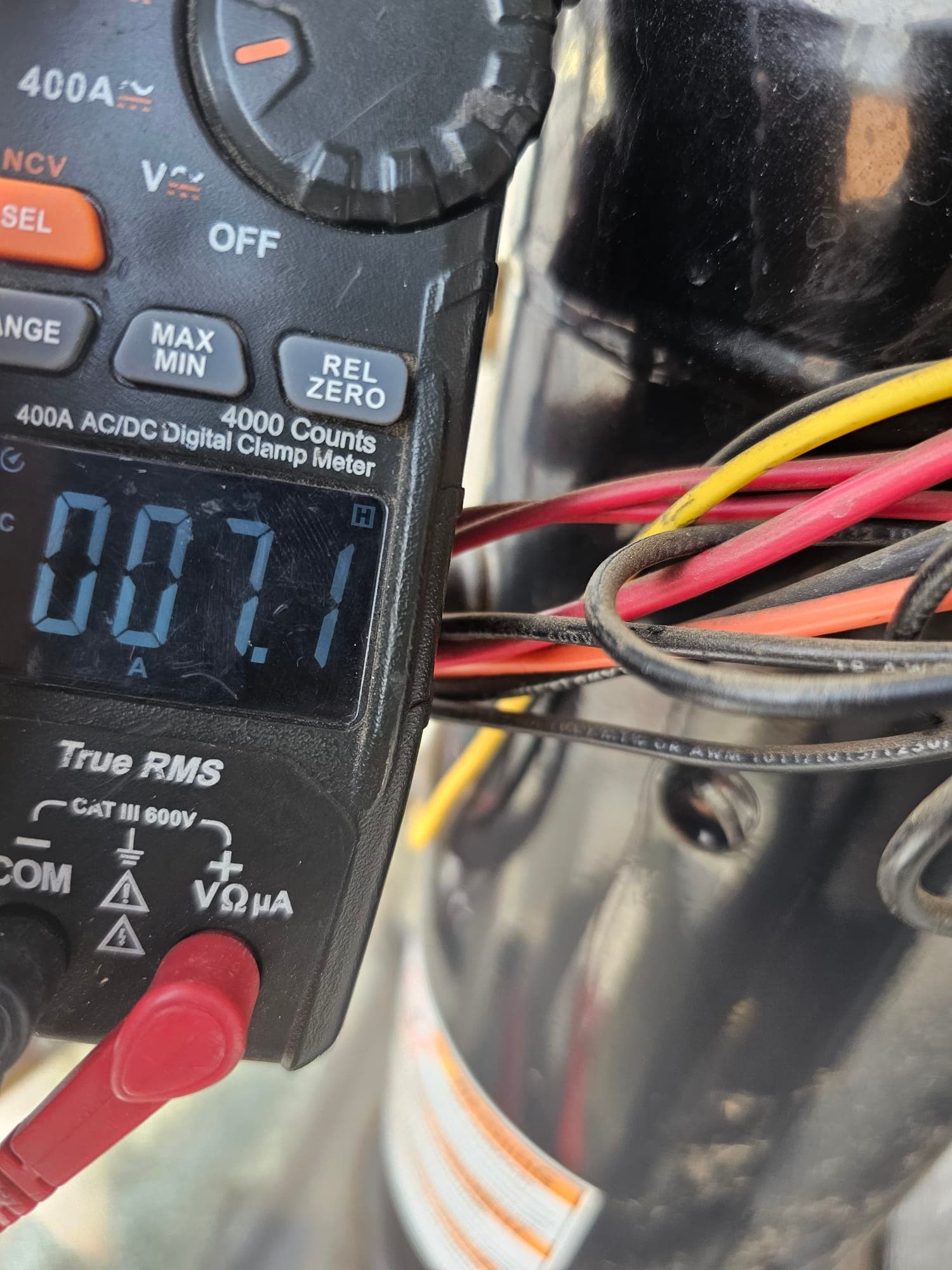 Diagnostic instrument display shows 87.1 A.