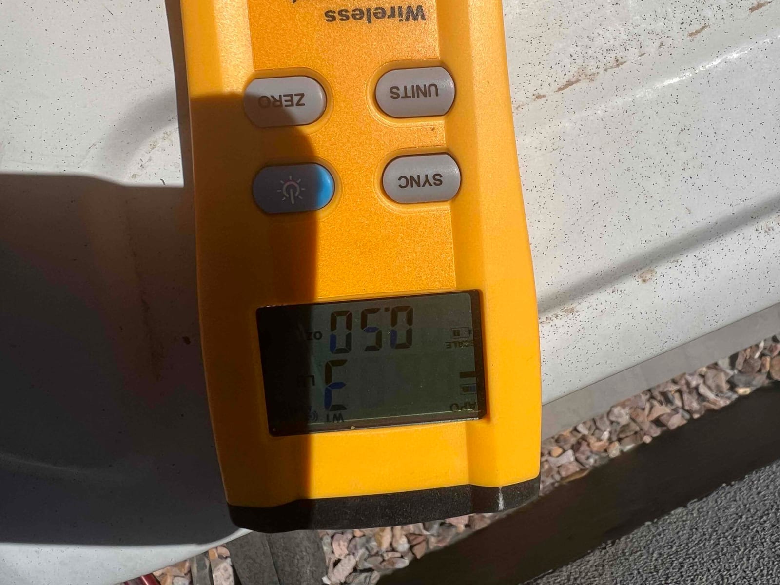 HVAC diagnostic instrument photographed during the service visit.