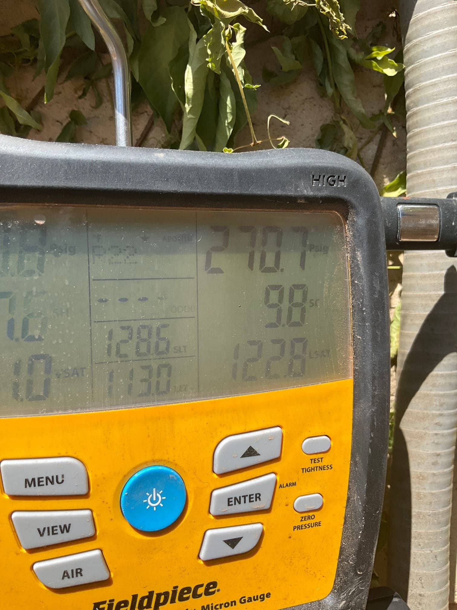 HVAC diagnostic instrument photographed during the service visit.