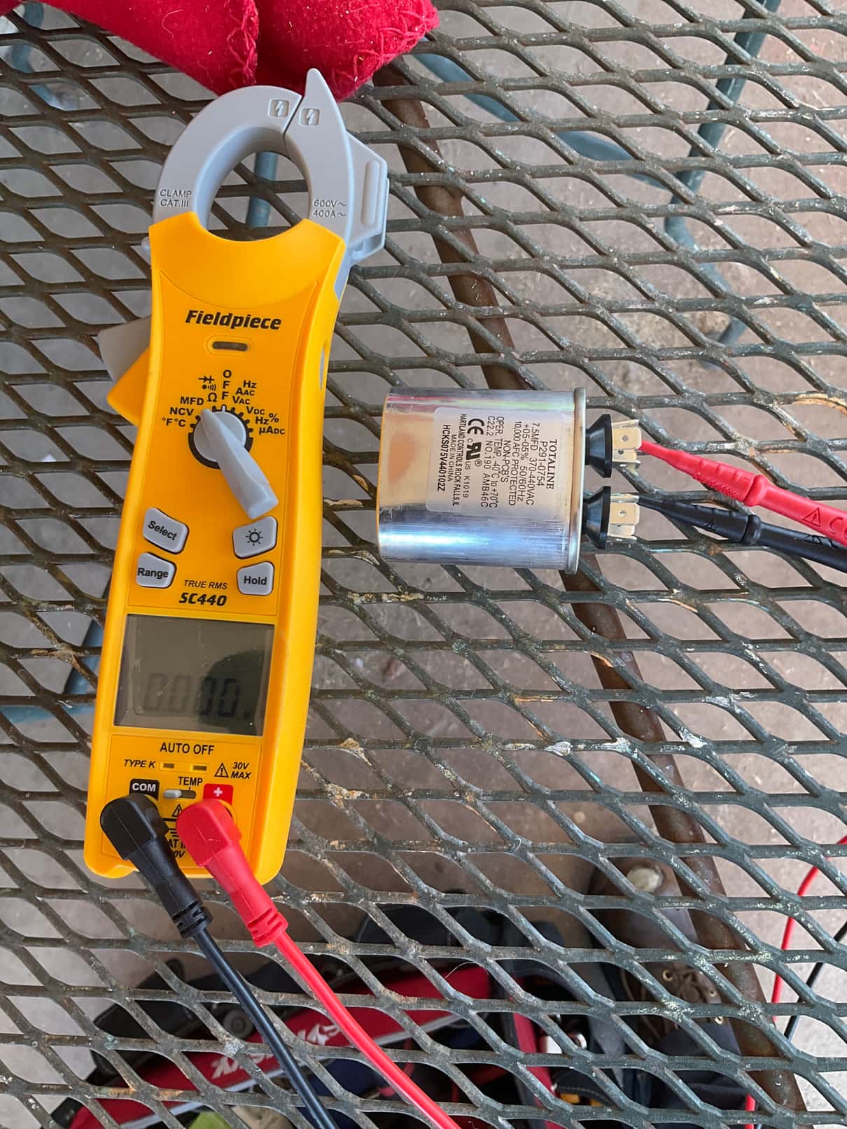 HVAC diagnostic instrument photographed during the service visit.