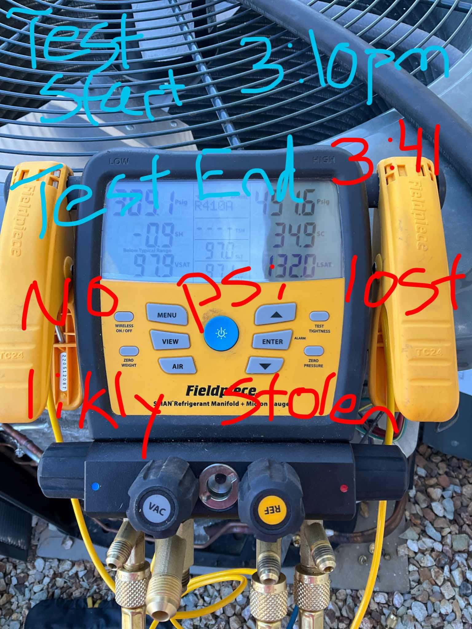 HVAC diagnostic instrument photographed during the service visit.