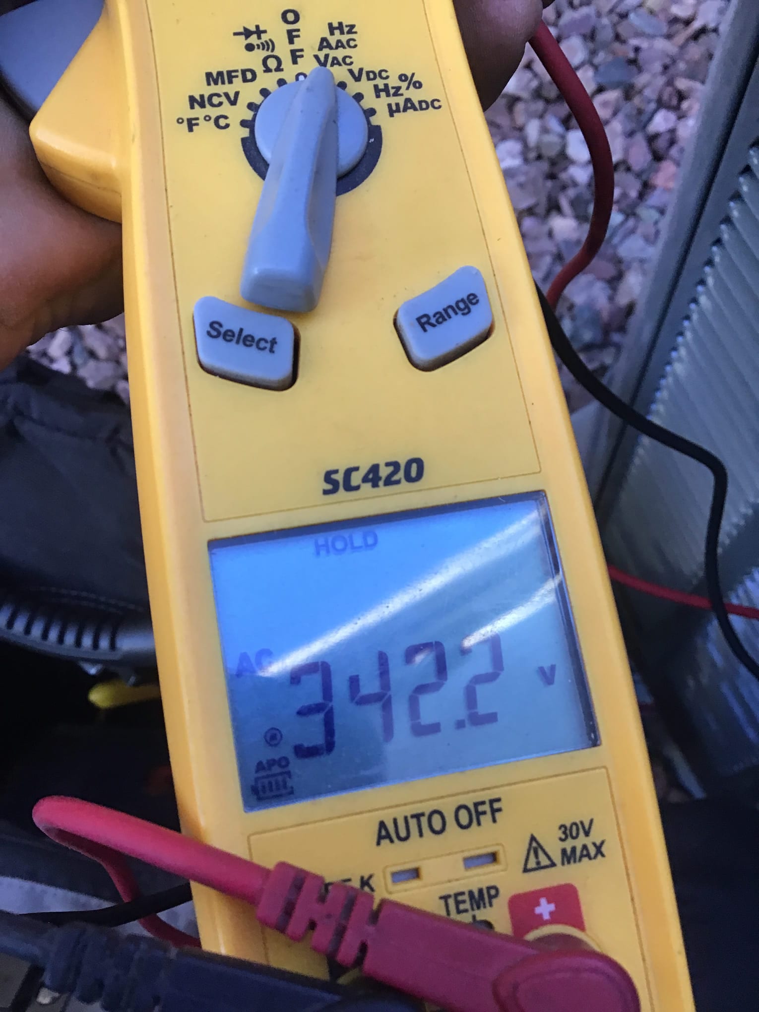 HVAC diagnostic instrument photographed during the service visit.