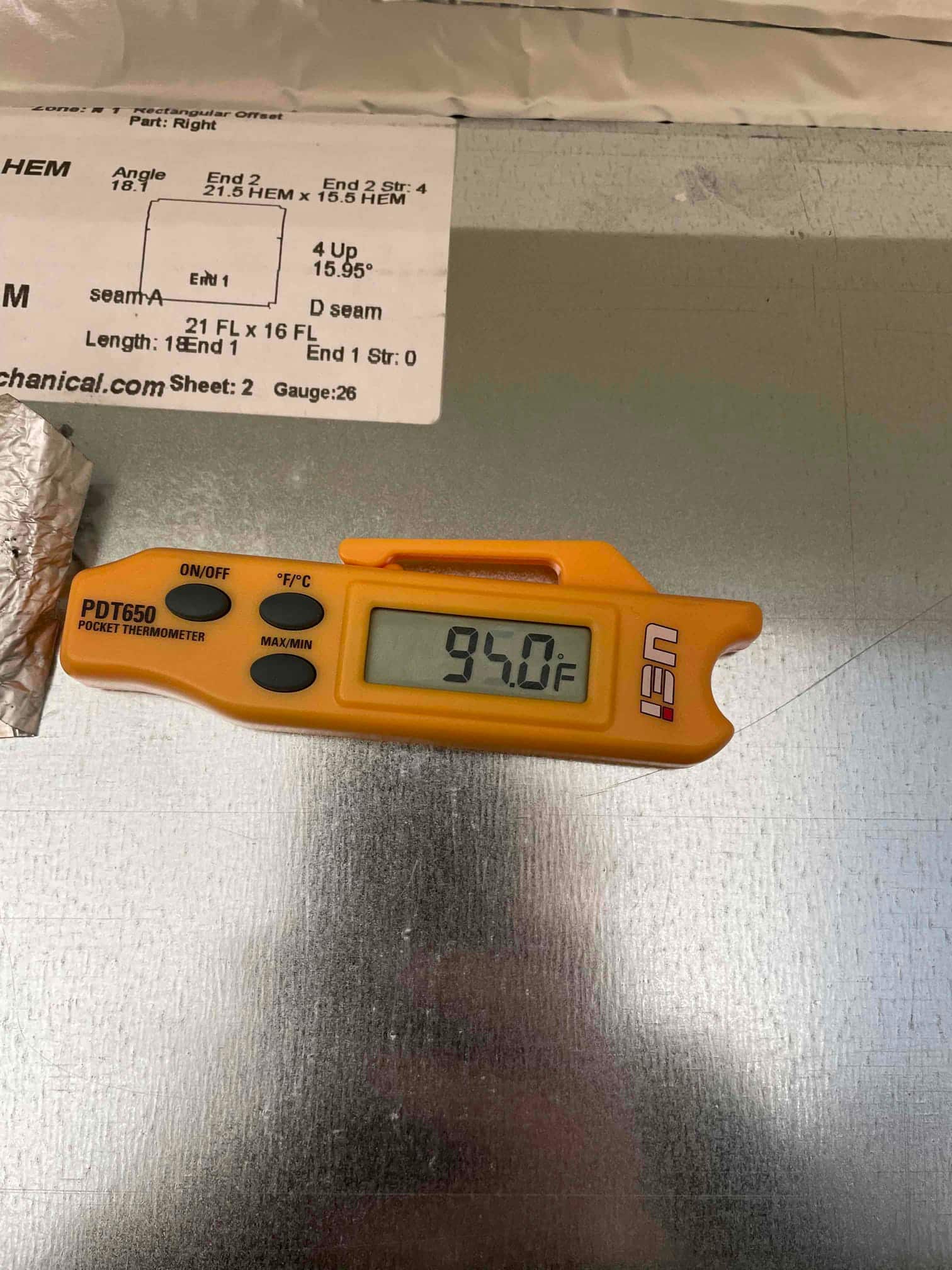 HVAC diagnostic instrument photographed during the service visit.