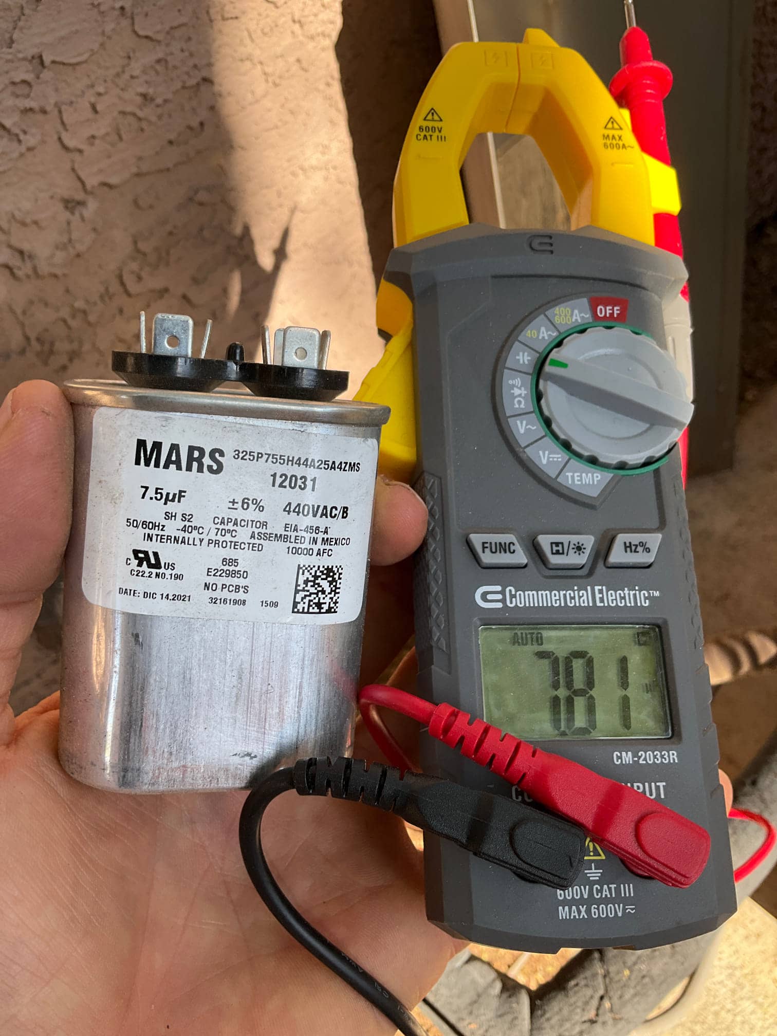 HVAC diagnostic instrument photographed during the service visit.