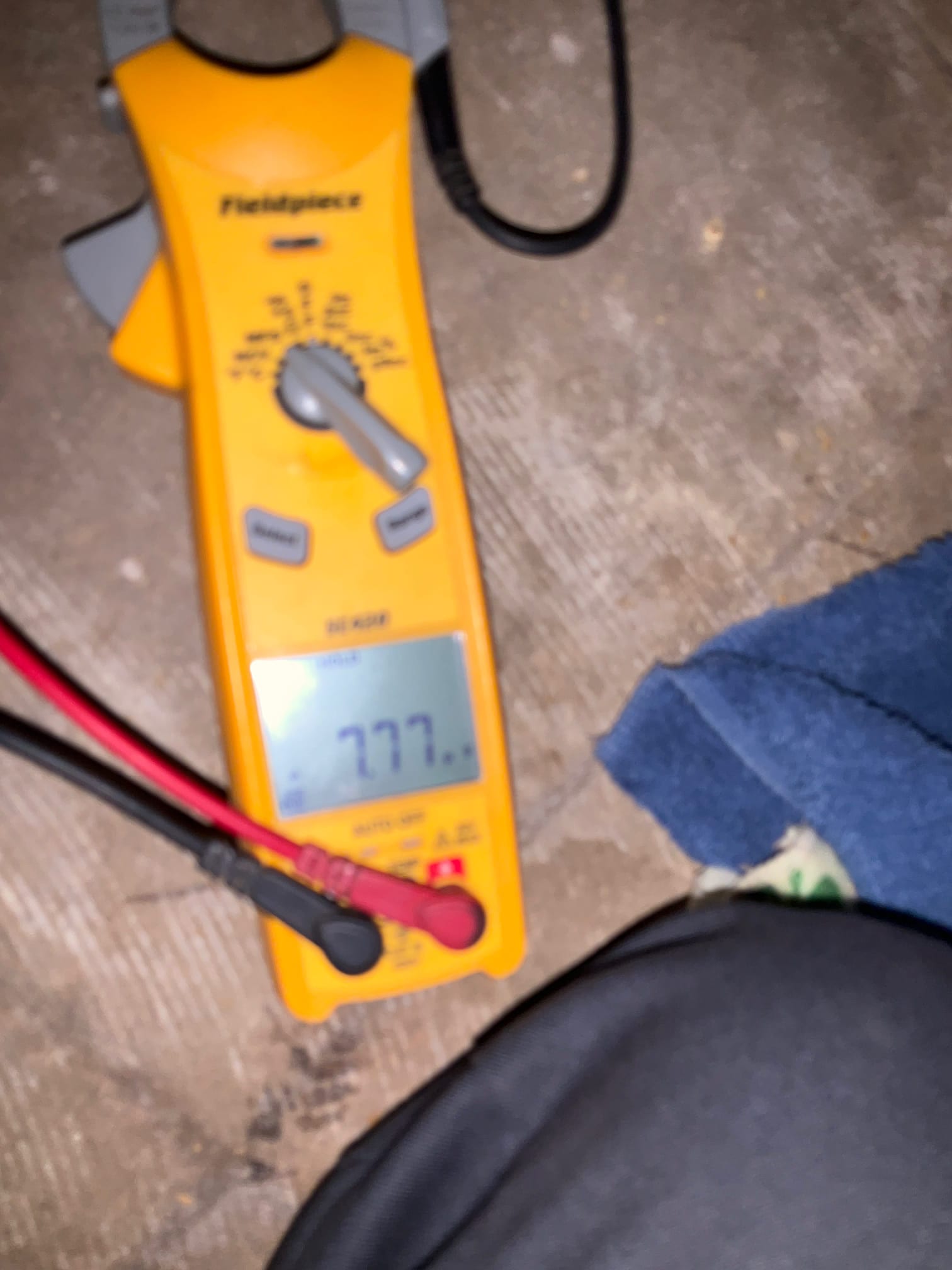 HVAC diagnostic instrument photographed during the service visit.