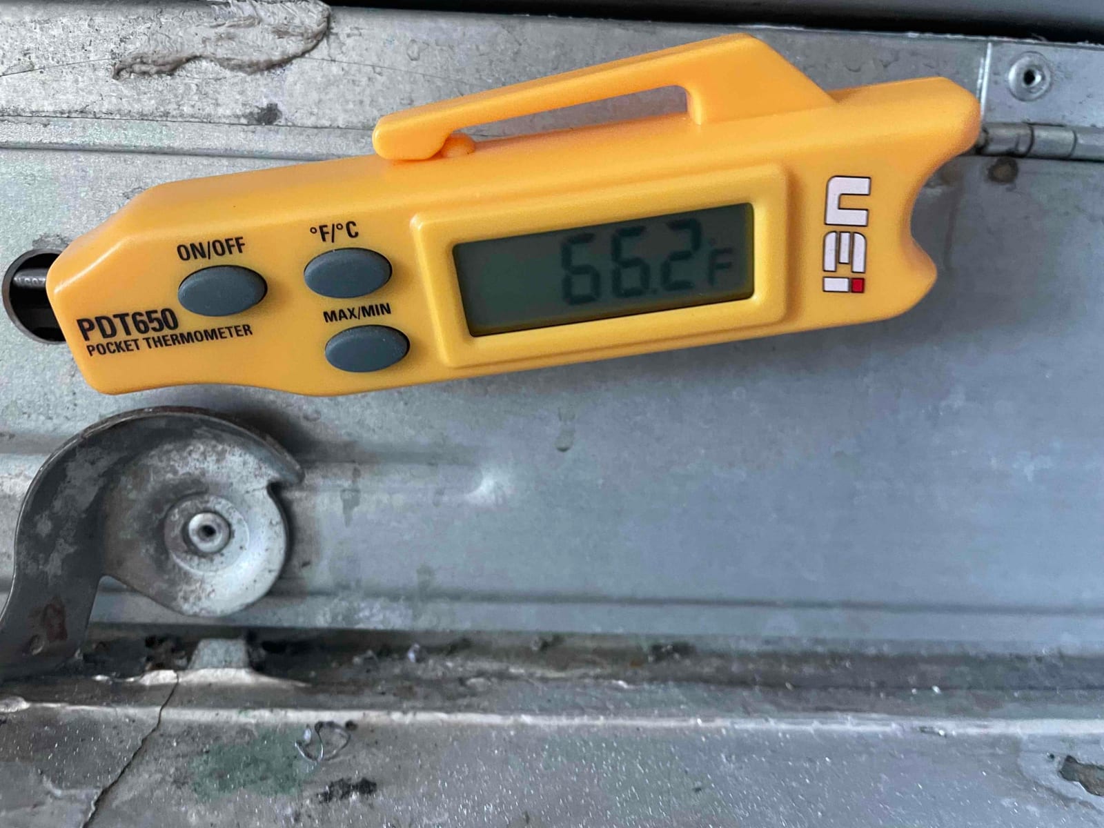 HVAC diagnostic instrument photographed during the service visit.