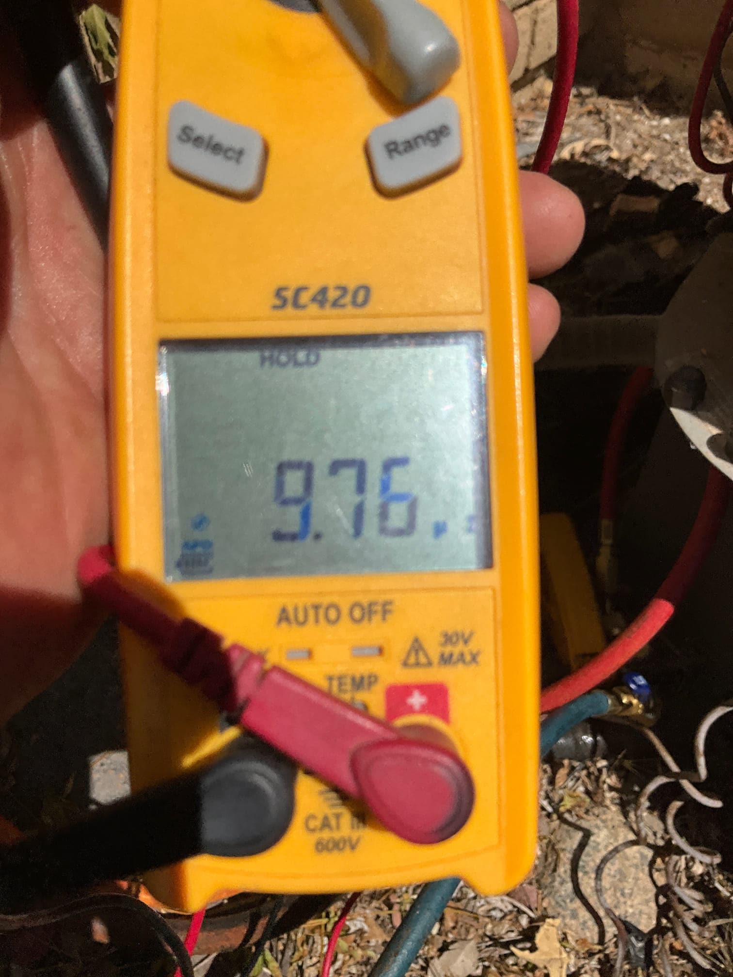 HVAC diagnostic instrument photographed during the service visit.