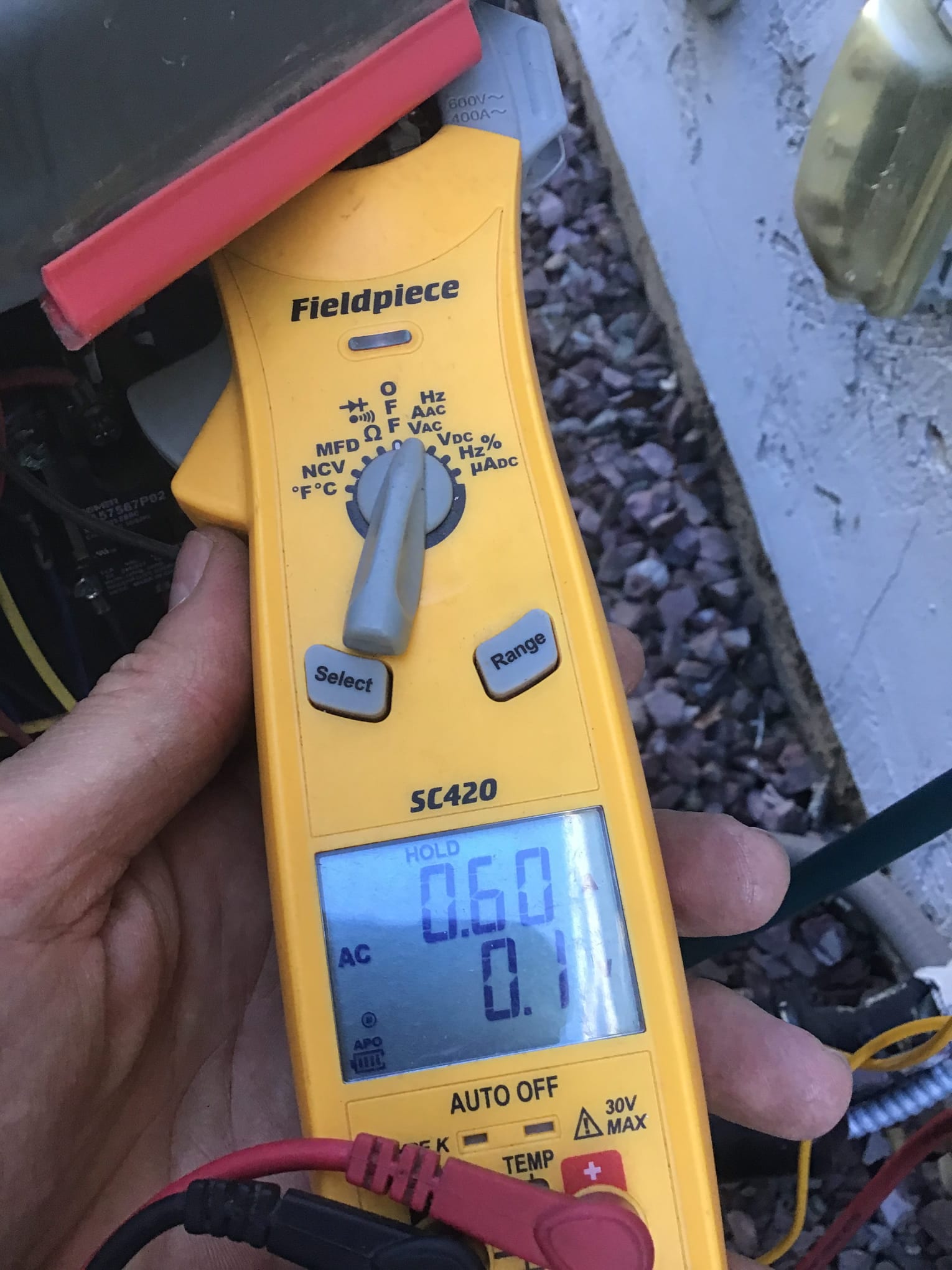 HVAC diagnostic instrument photographed during the service visit.