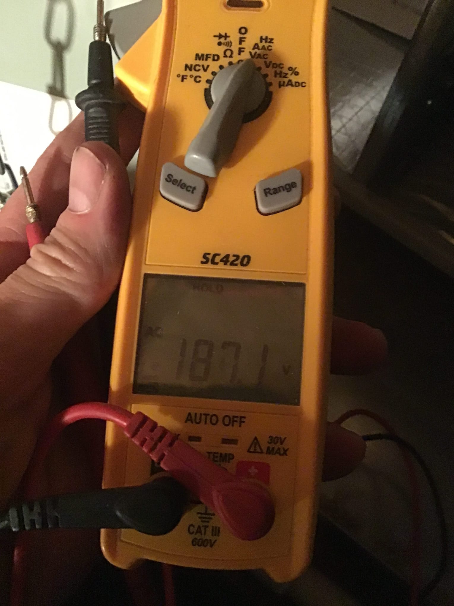 HVAC diagnostic instrument photographed during the service visit.