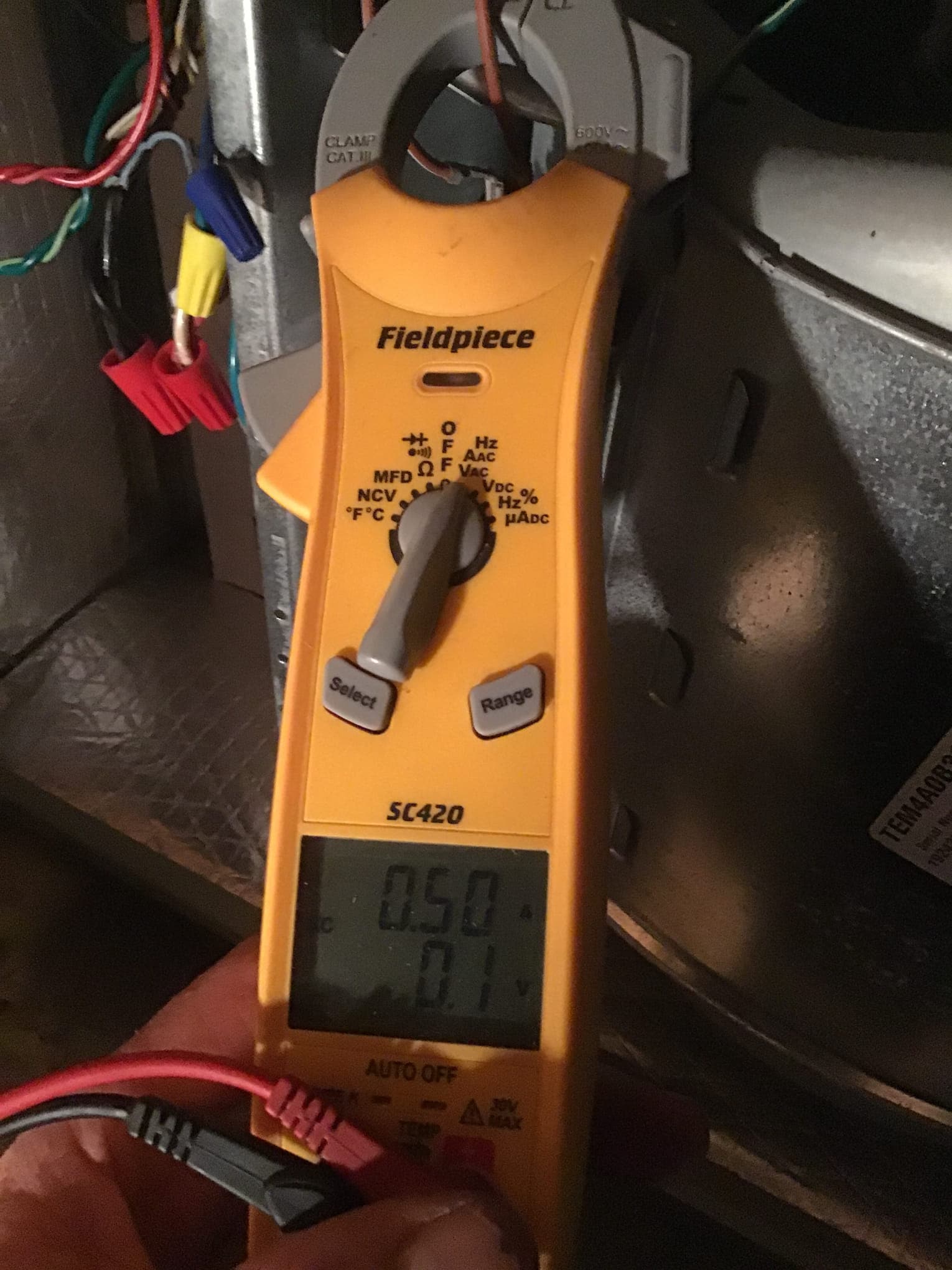 HVAC diagnostic instrument photographed during the service visit.