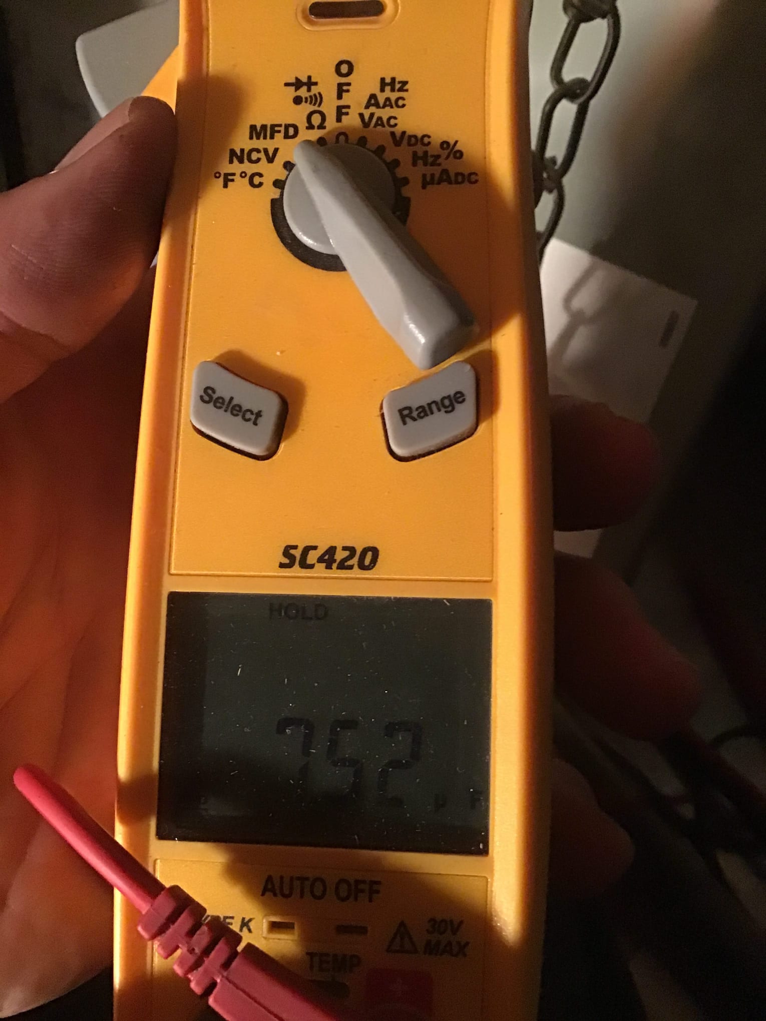 HVAC diagnostic instrument photographed during the service visit.