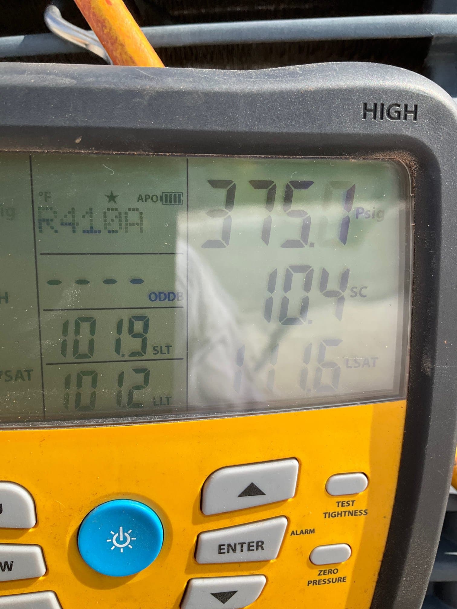 HVAC diagnostic instrument photographed during the service visit.