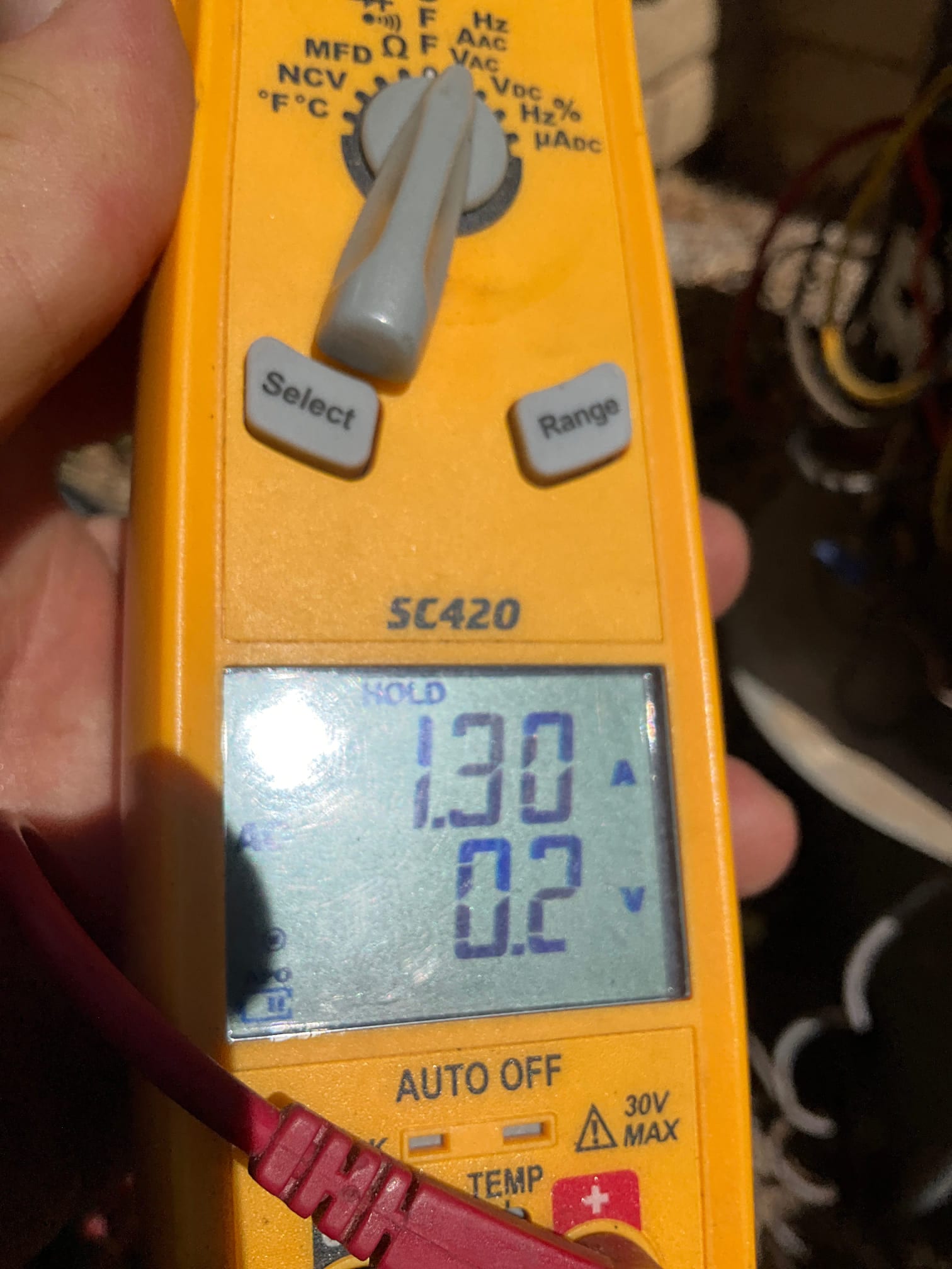 HVAC diagnostic instrument photographed during the service visit.