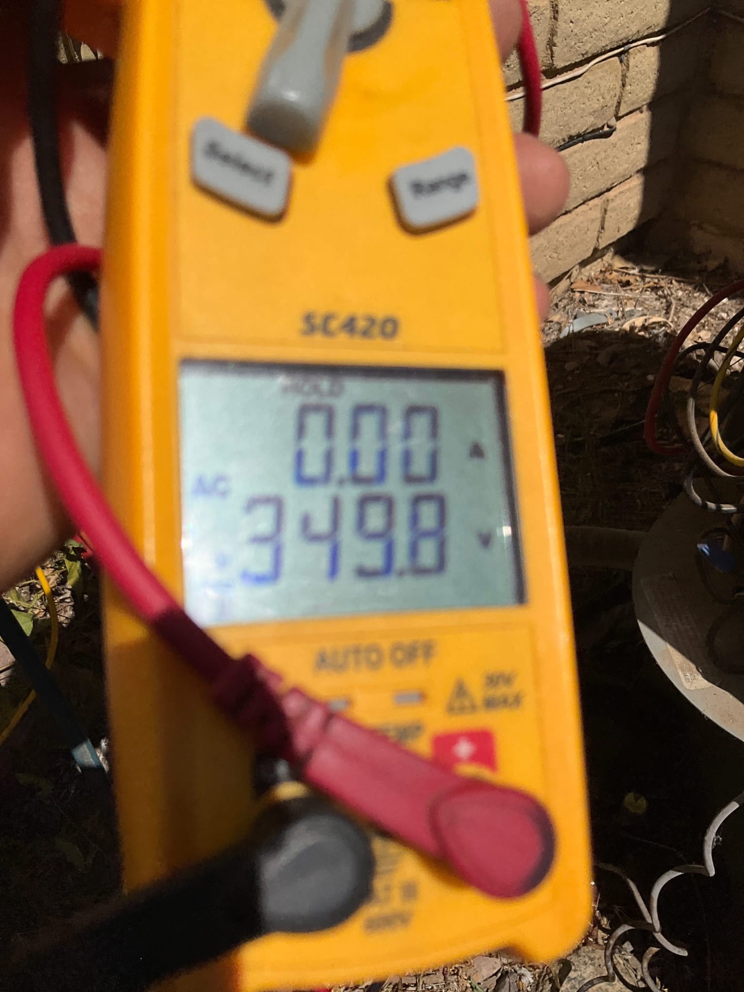 HVAC diagnostic instrument photographed during the service visit.