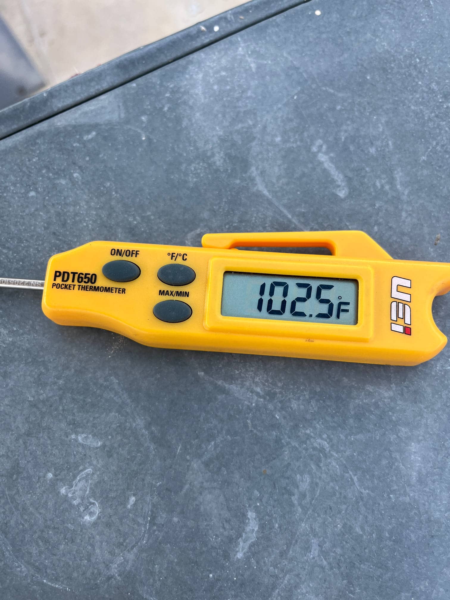 HVAC diagnostic instrument photographed during the service visit.