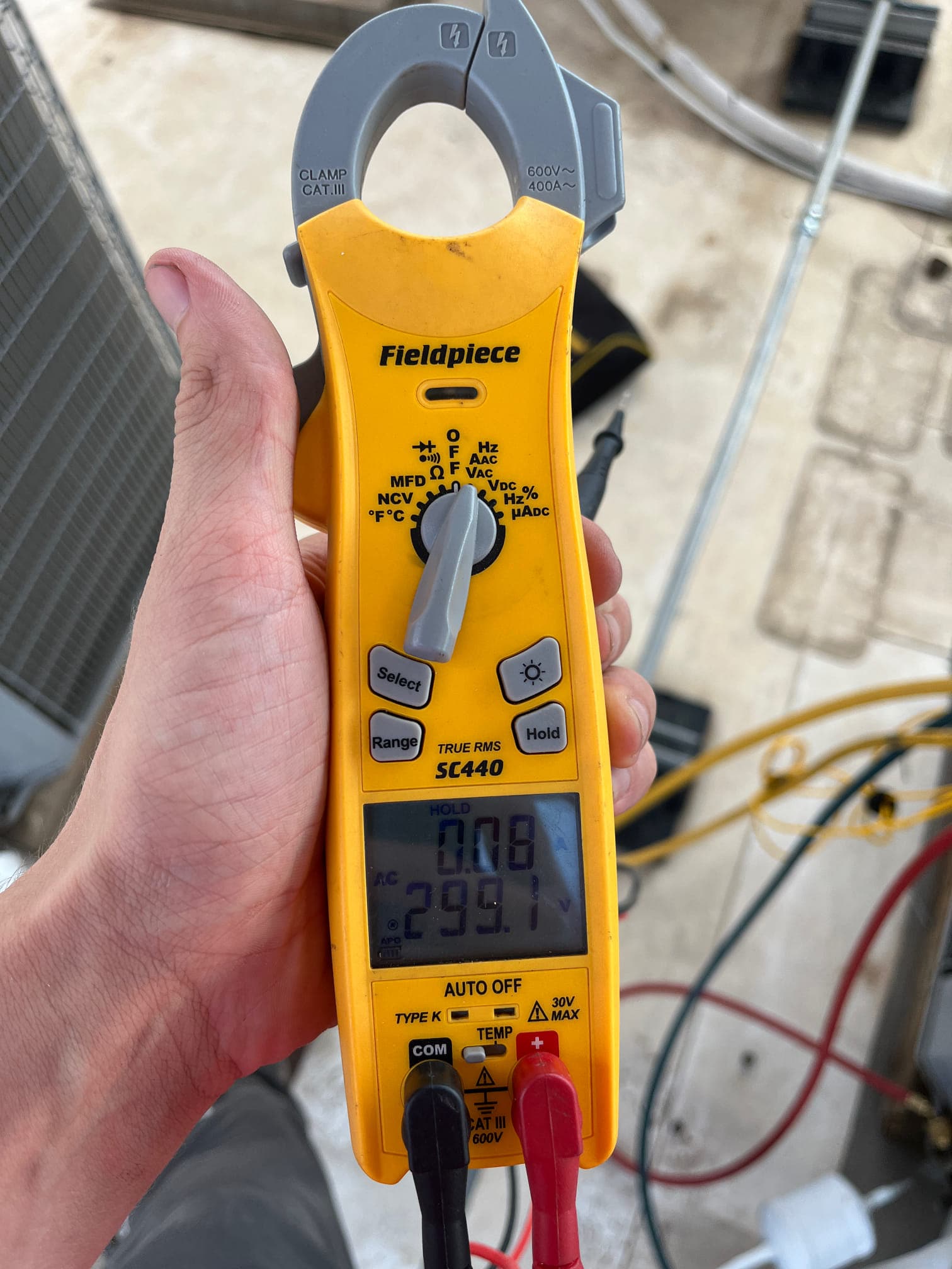 HVAC diagnostic instrument photographed during the service visit.