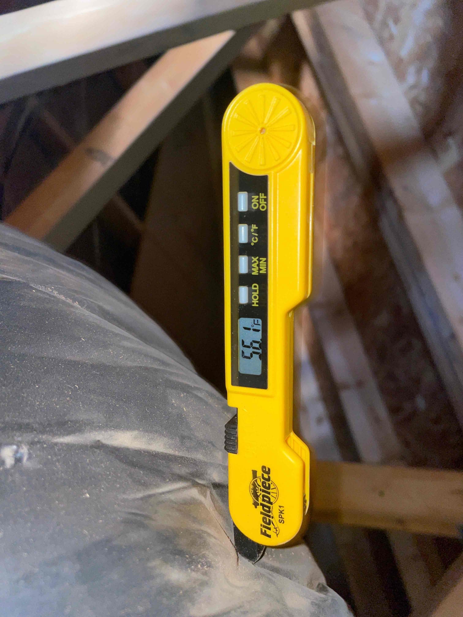 HVAC diagnostic instrument photographed during the service visit.