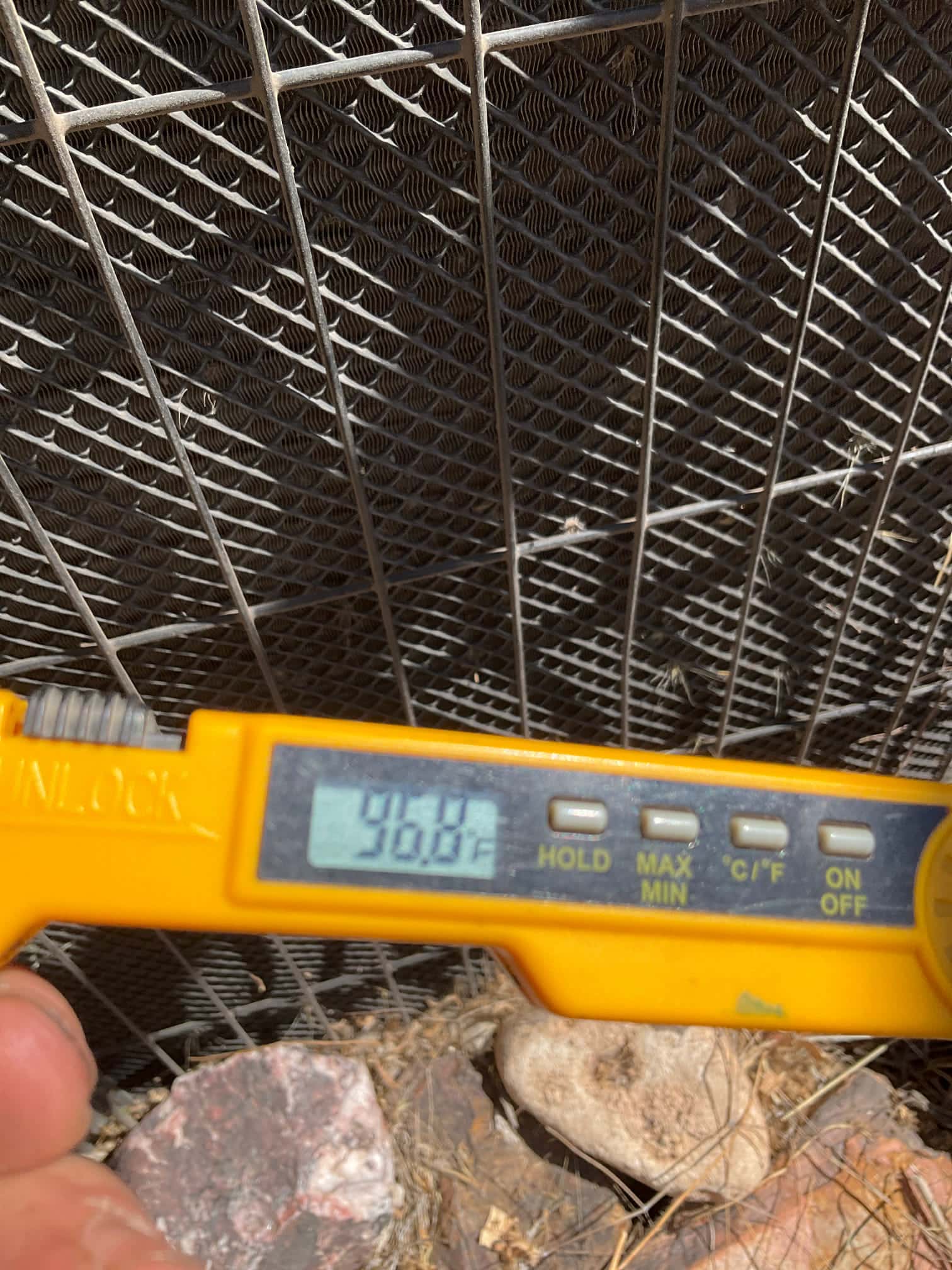 HVAC diagnostic instrument photographed during the service visit.