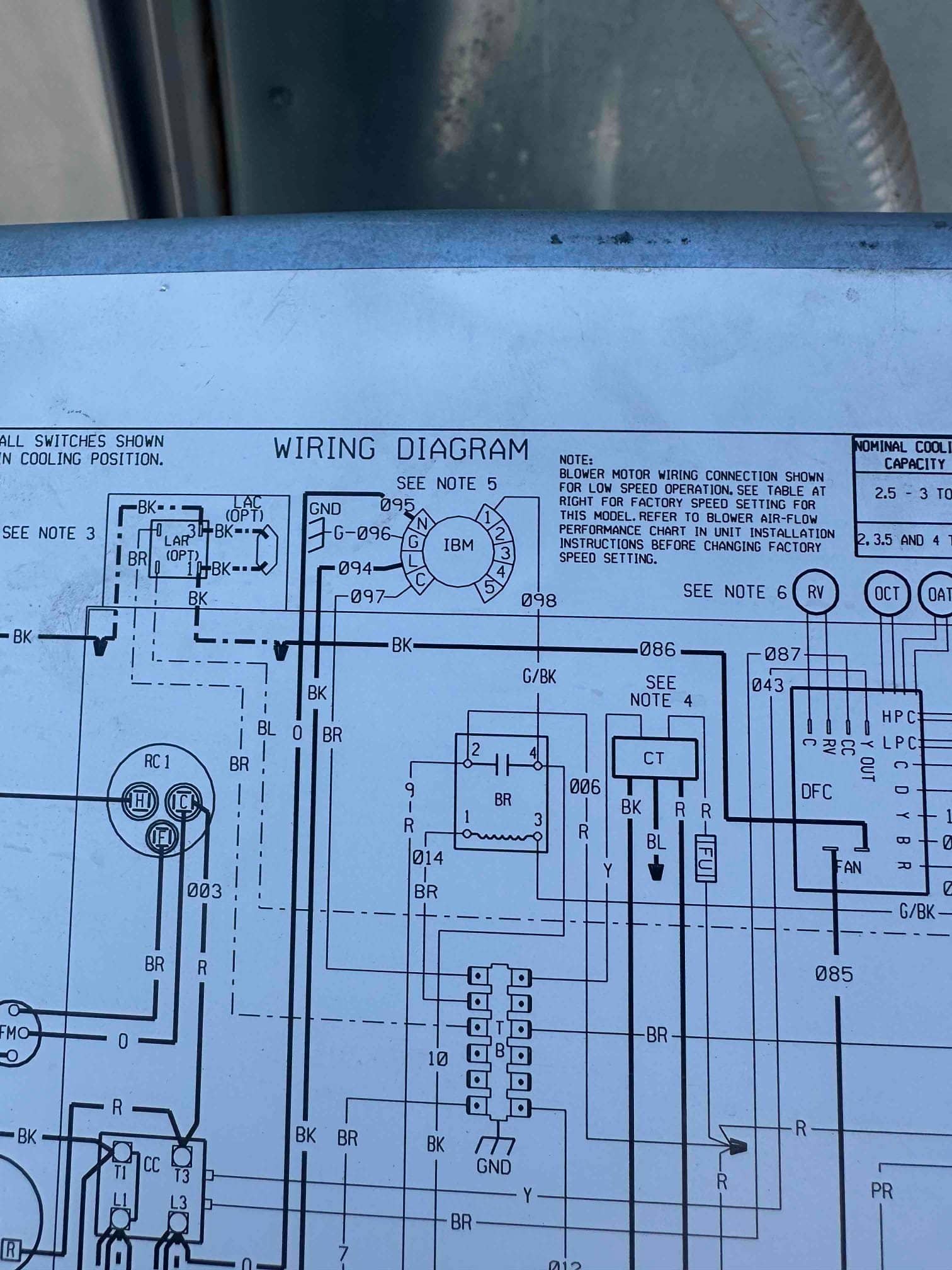 Air handler wiring diagram sticker showing motor connections, capacitor leads, and terminal designations for cooling operation.