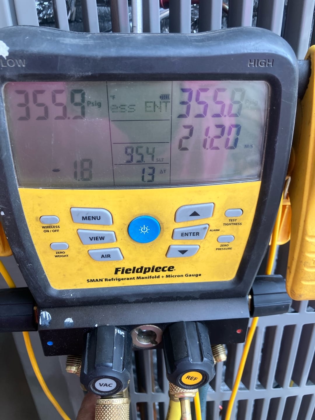 Digital manifold shows both high and low sides holding 356 PSI during a nitrogen pressure test on the new system.