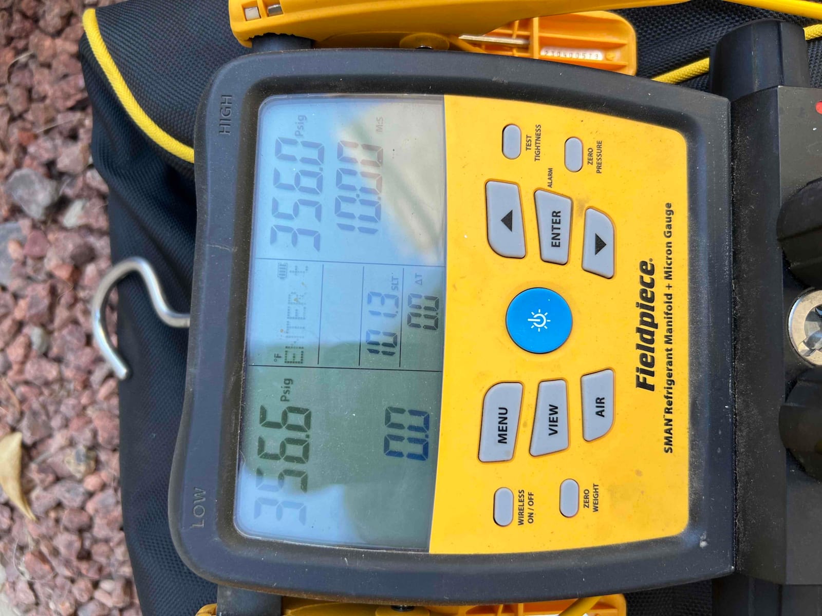 Digital manifold shows equal pressure on both sides at 356 PSI, documenting the nitrogen pressure test on the newly installed system.