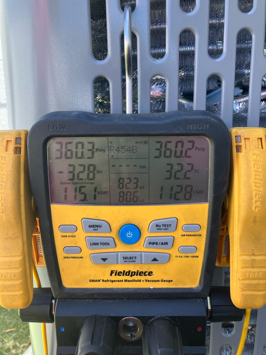 Digital manifold shows equal pressures around 360 PSI on both sides during a nitrogen pressure test of the new system.