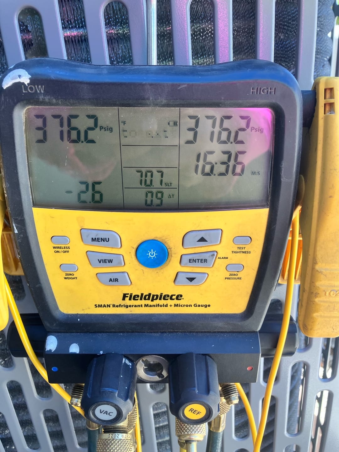 Digital manifold shows equal pressures of 376.2 PSI on both sides during the nitrogen pressure test of the new system.