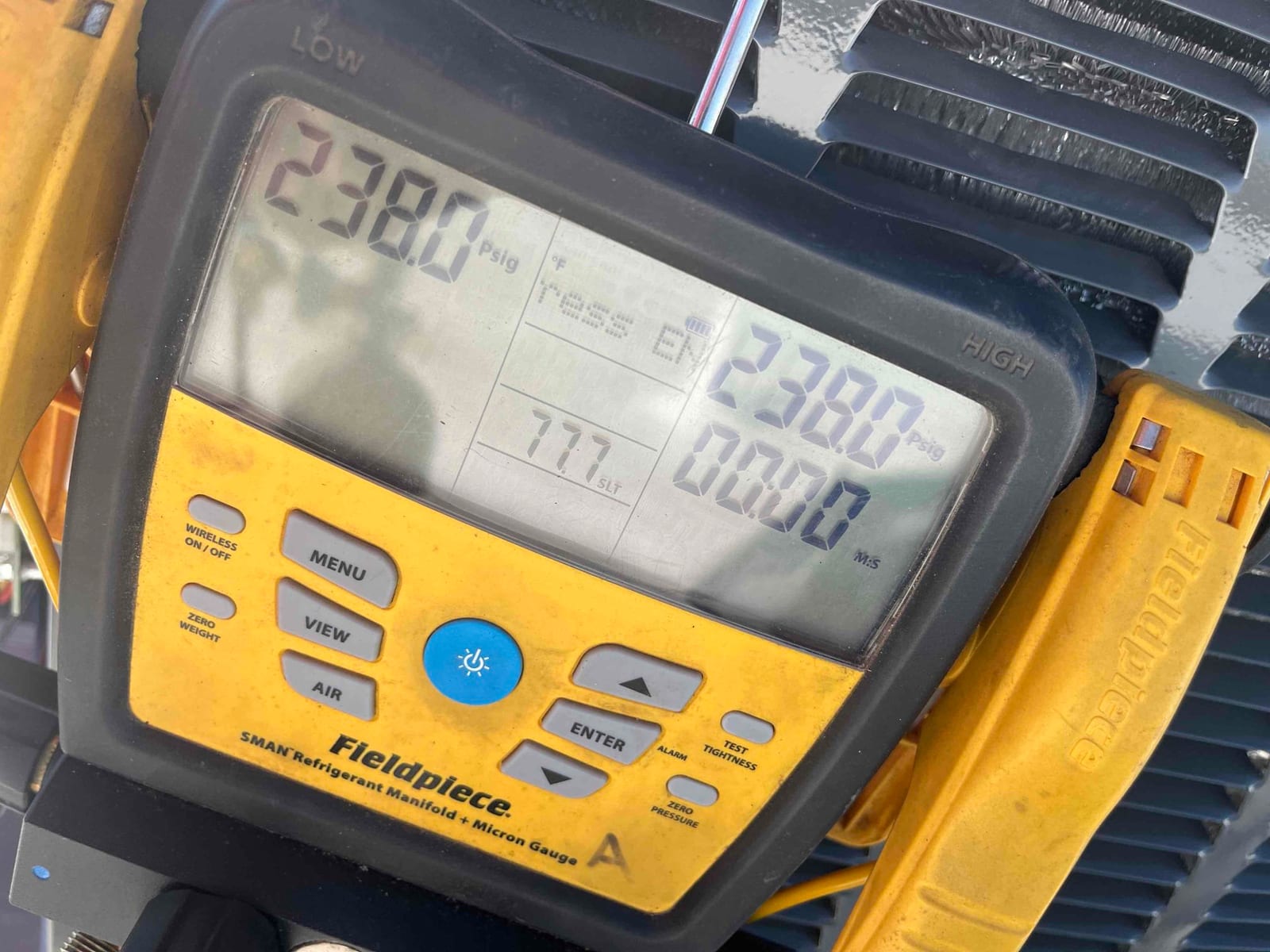 Digital manifold shows equal pressures on both sides at 2380 PSI, documenting a high-pressure nitrogen test on the new system.