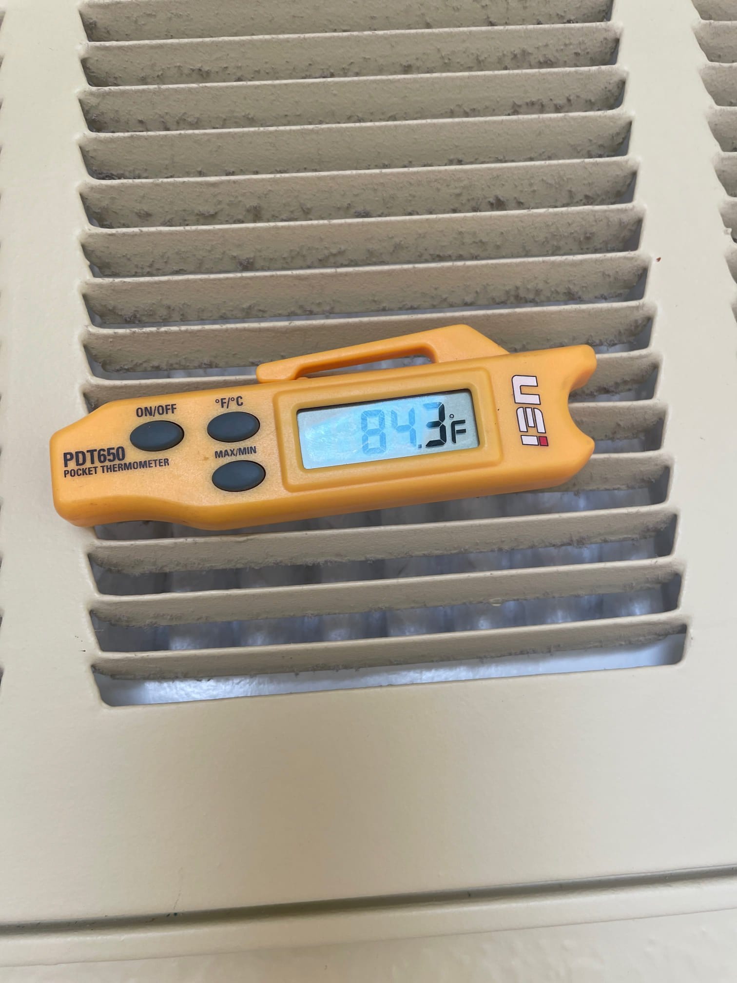HVAC diagnostic instrument photographed during the service visit.