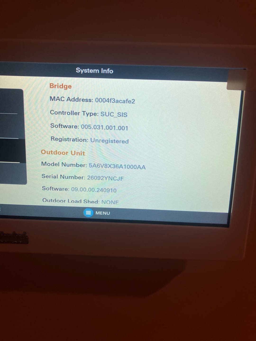 Thermostat display shows system information screen for the connected HVAC controls and outdoor unit status during setup.