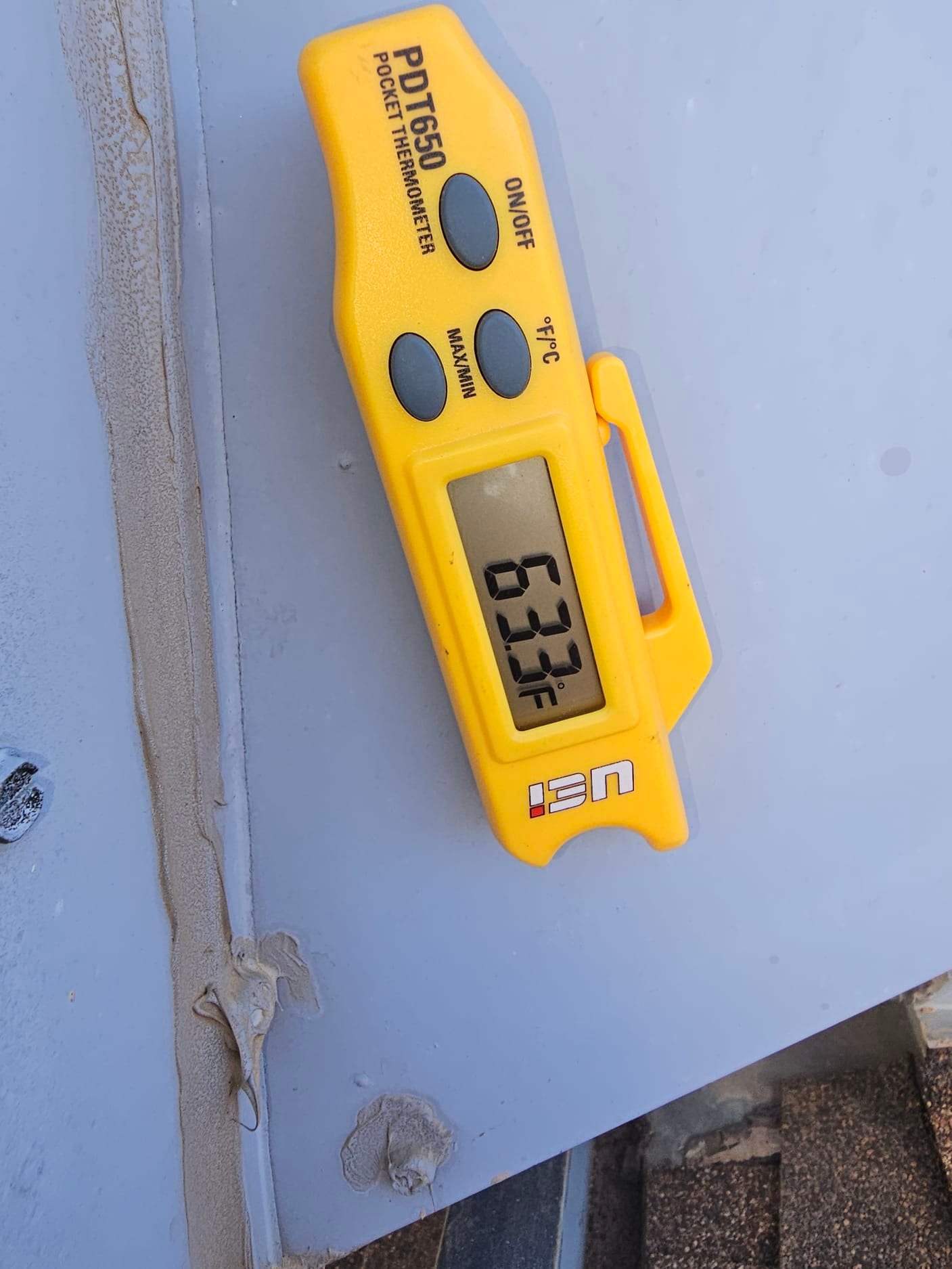 Diagnostic instrument display shows 63.3 °F.