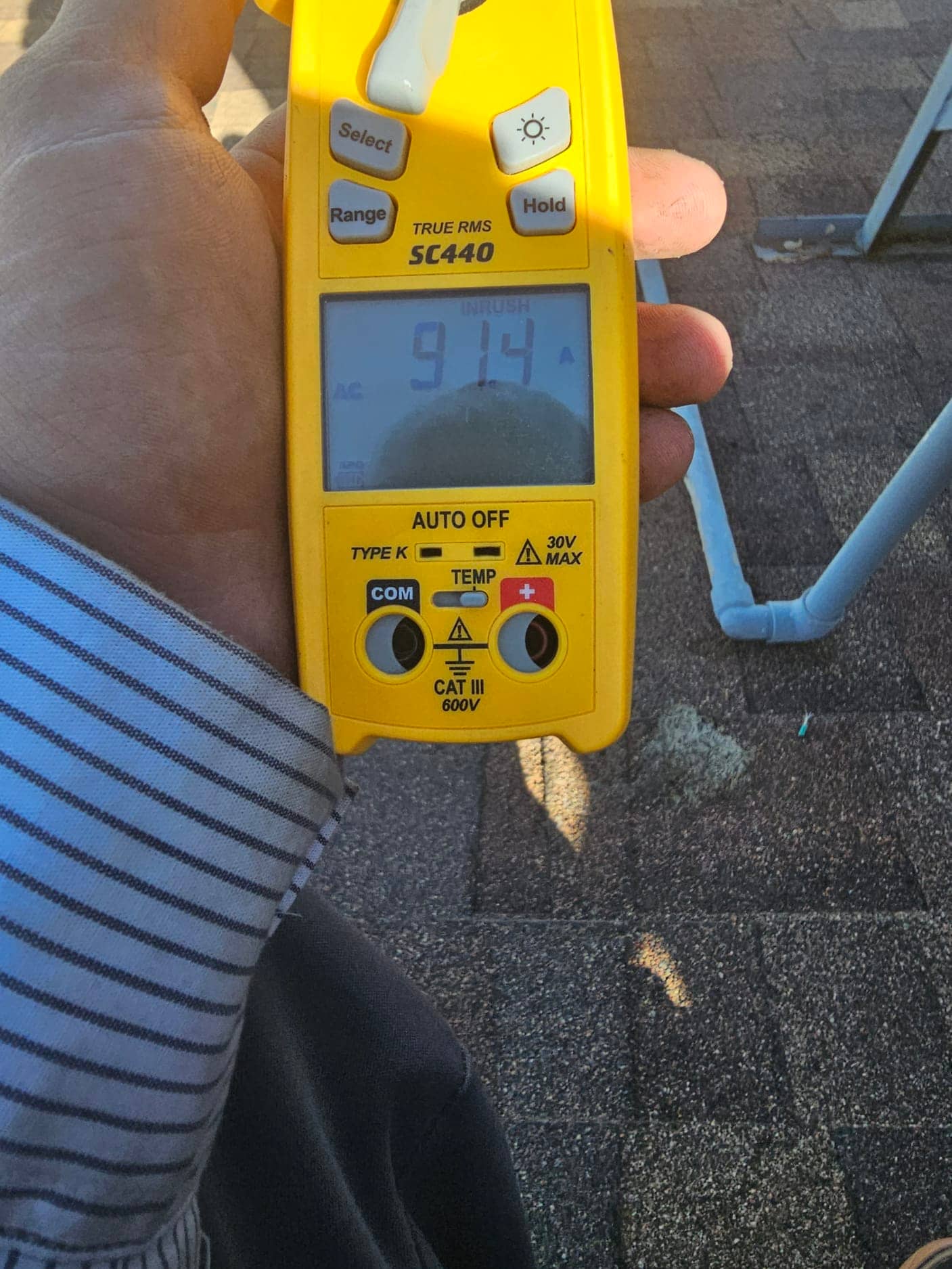 Diagnostic instrument display shows 91.4 A.