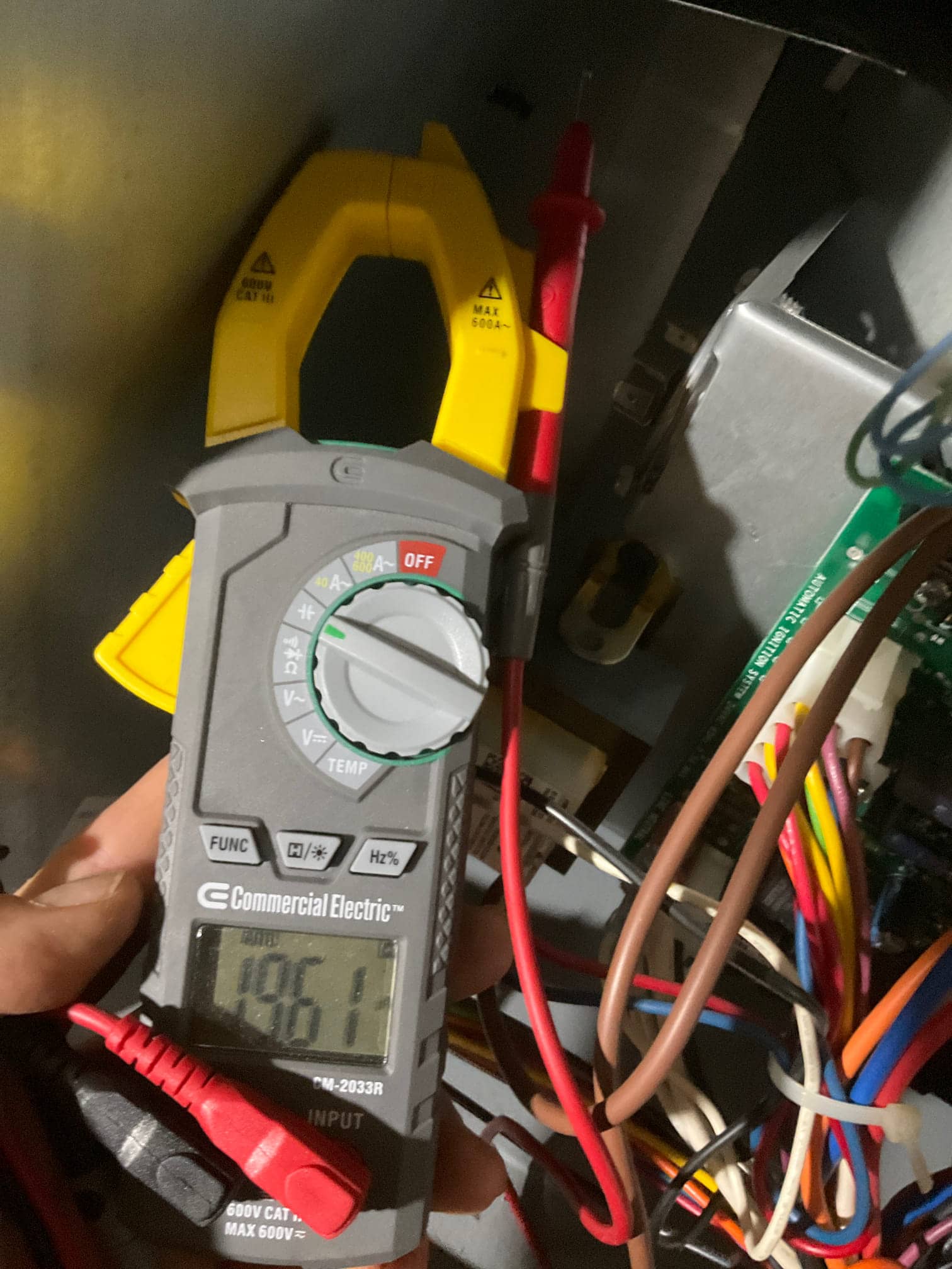 Diagnostic instrument display shows 196.1 V.