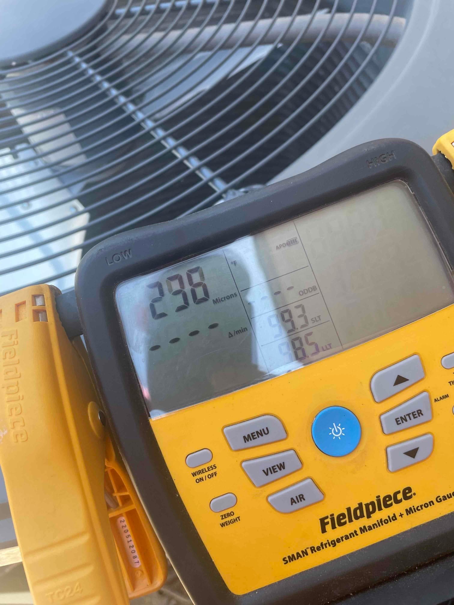 Diagnostic instrument display shows 298 microns.
