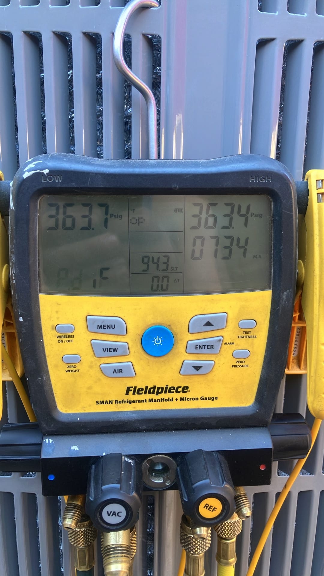 Digital manifold shows equal pressures around 363 PSI on both sides during a nitrogen pressure test of the new system.