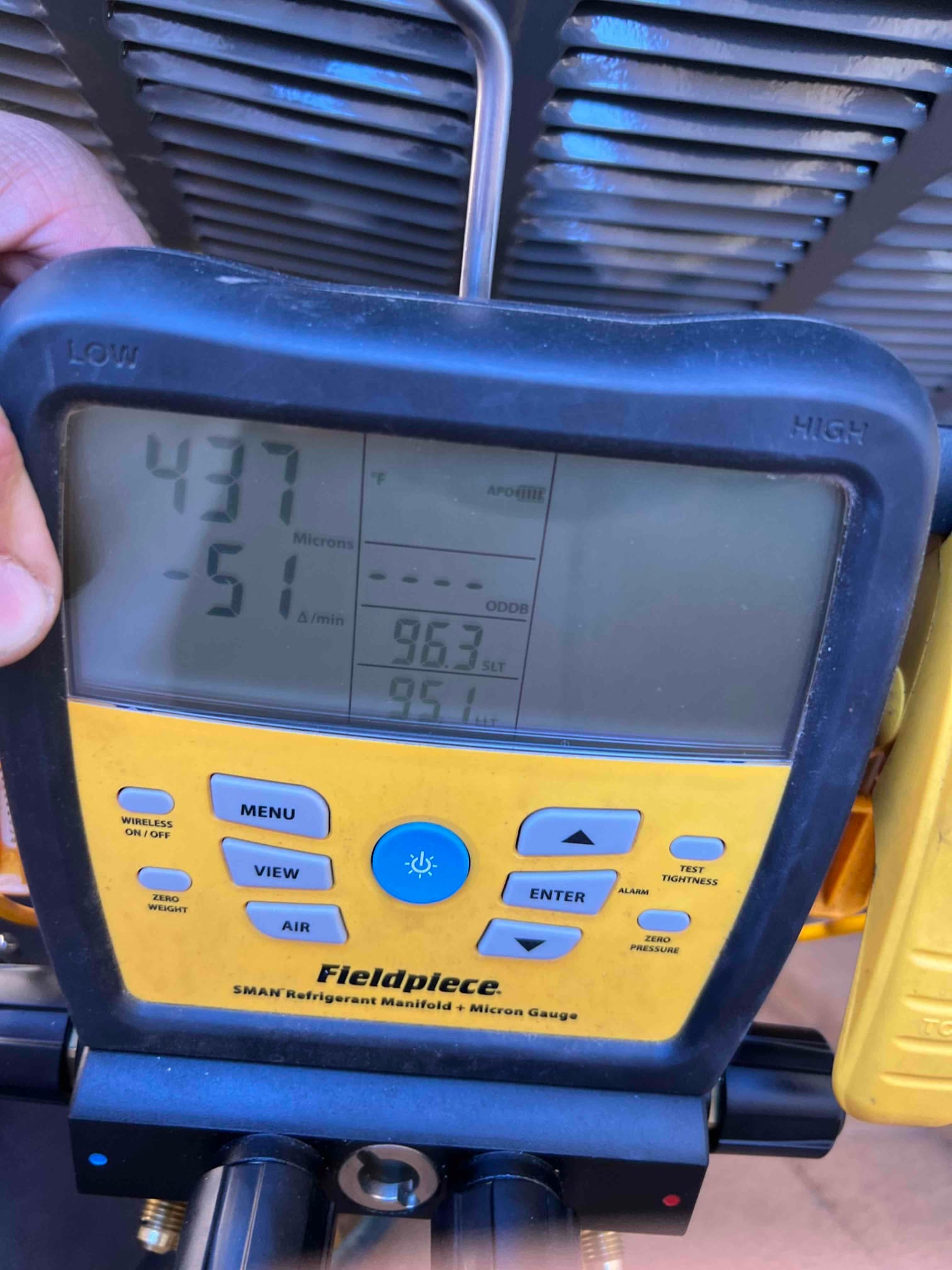 Digital manifold shows both high and low sides equalized at 437 PSI, documenting a nitrogen pressure test on the new system.