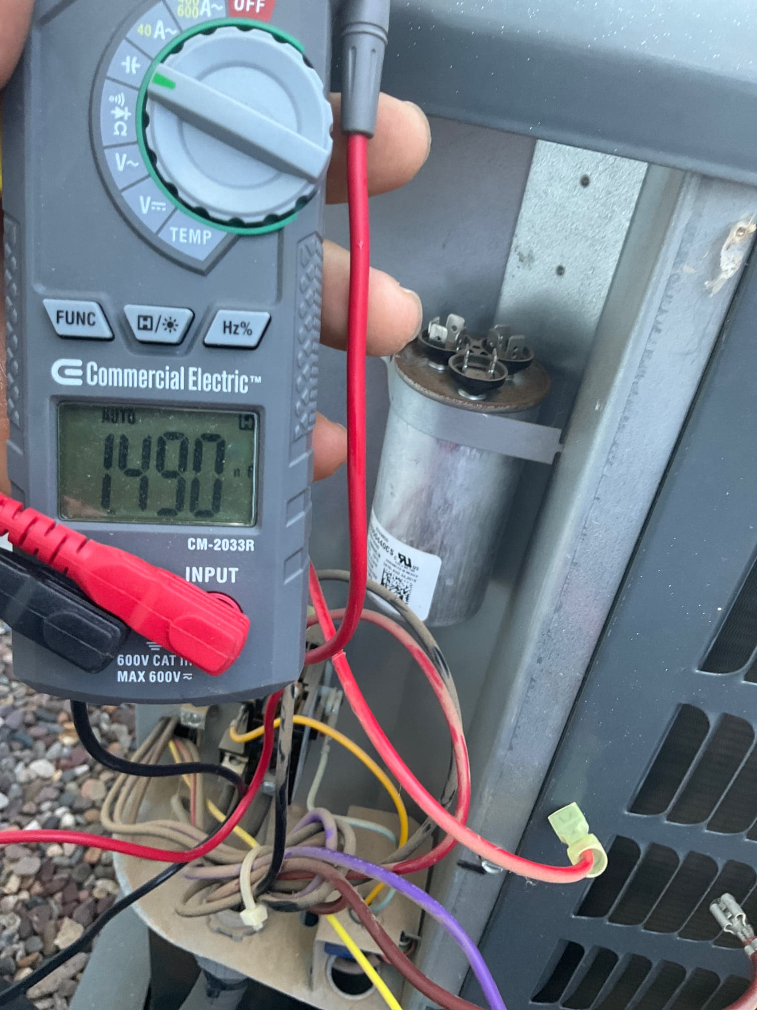 HVAC diagnostic instrument photographed during the service visit.