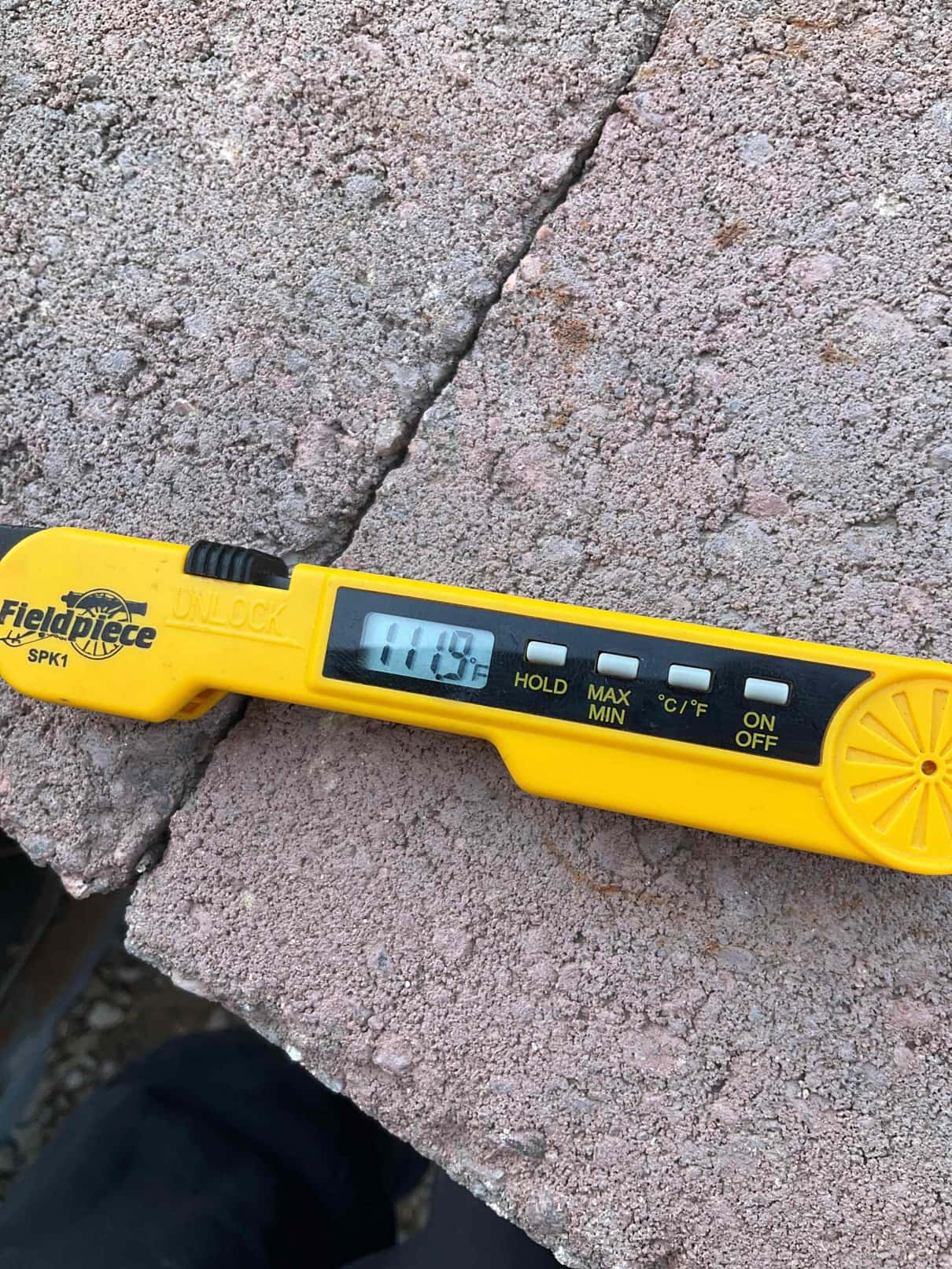 Diagnostic instrument display shows 111.9 °F.
