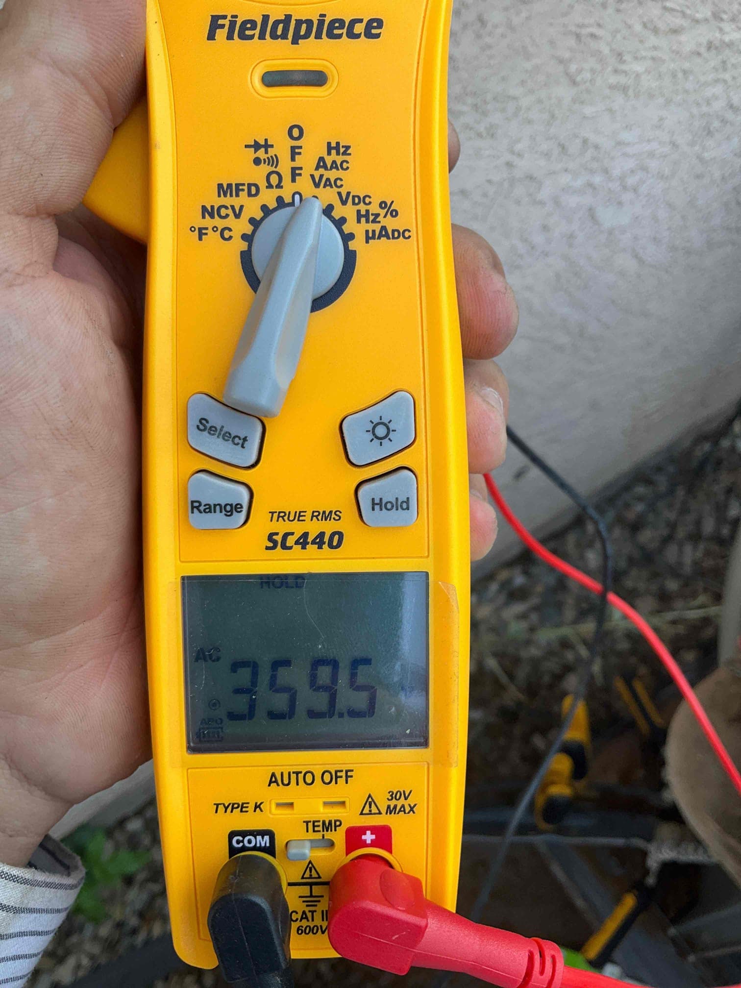 Diagnostic instrument display shows 359.5 V.
