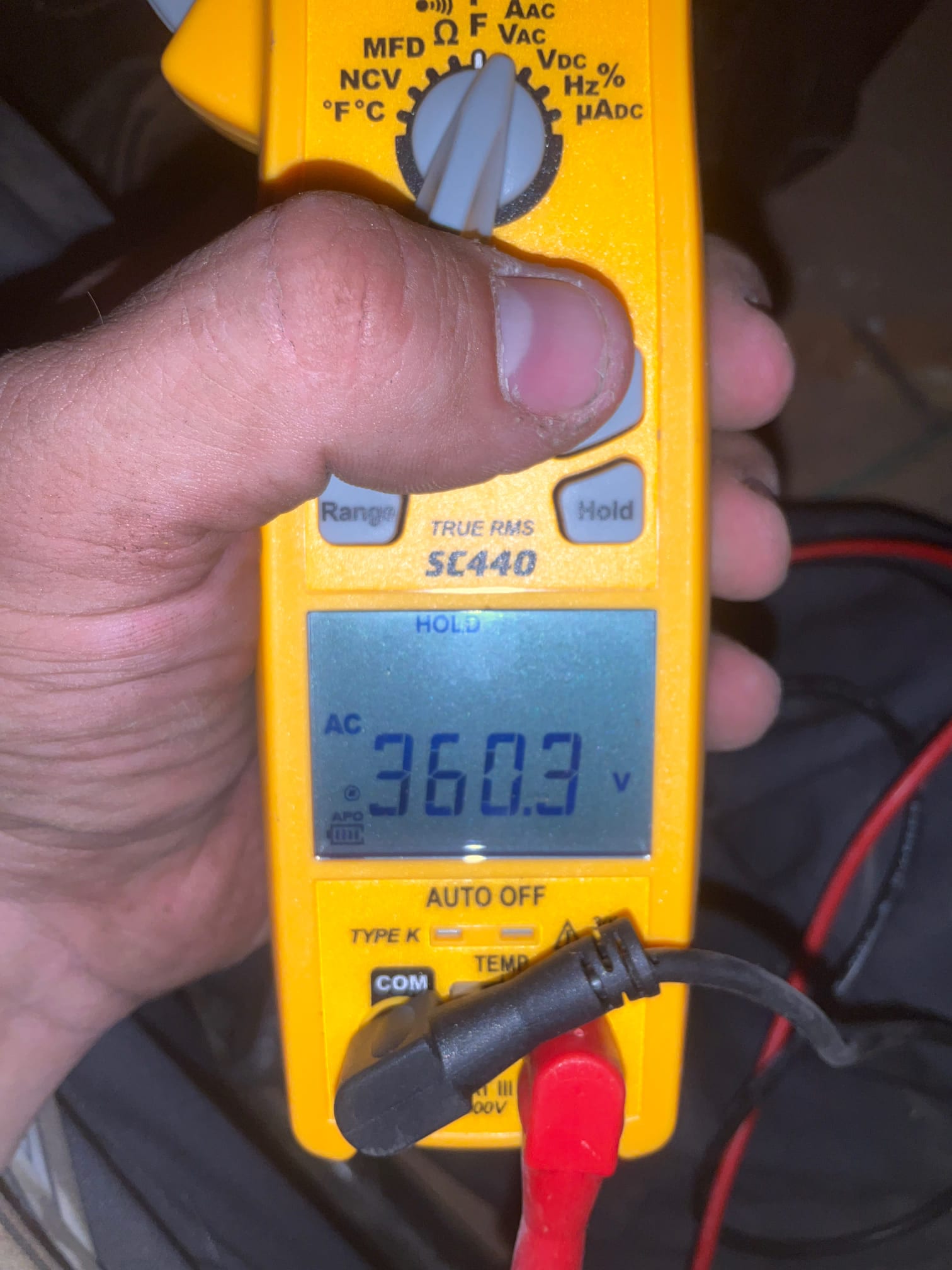 Diagnostic instrument display shows 360.3 V.