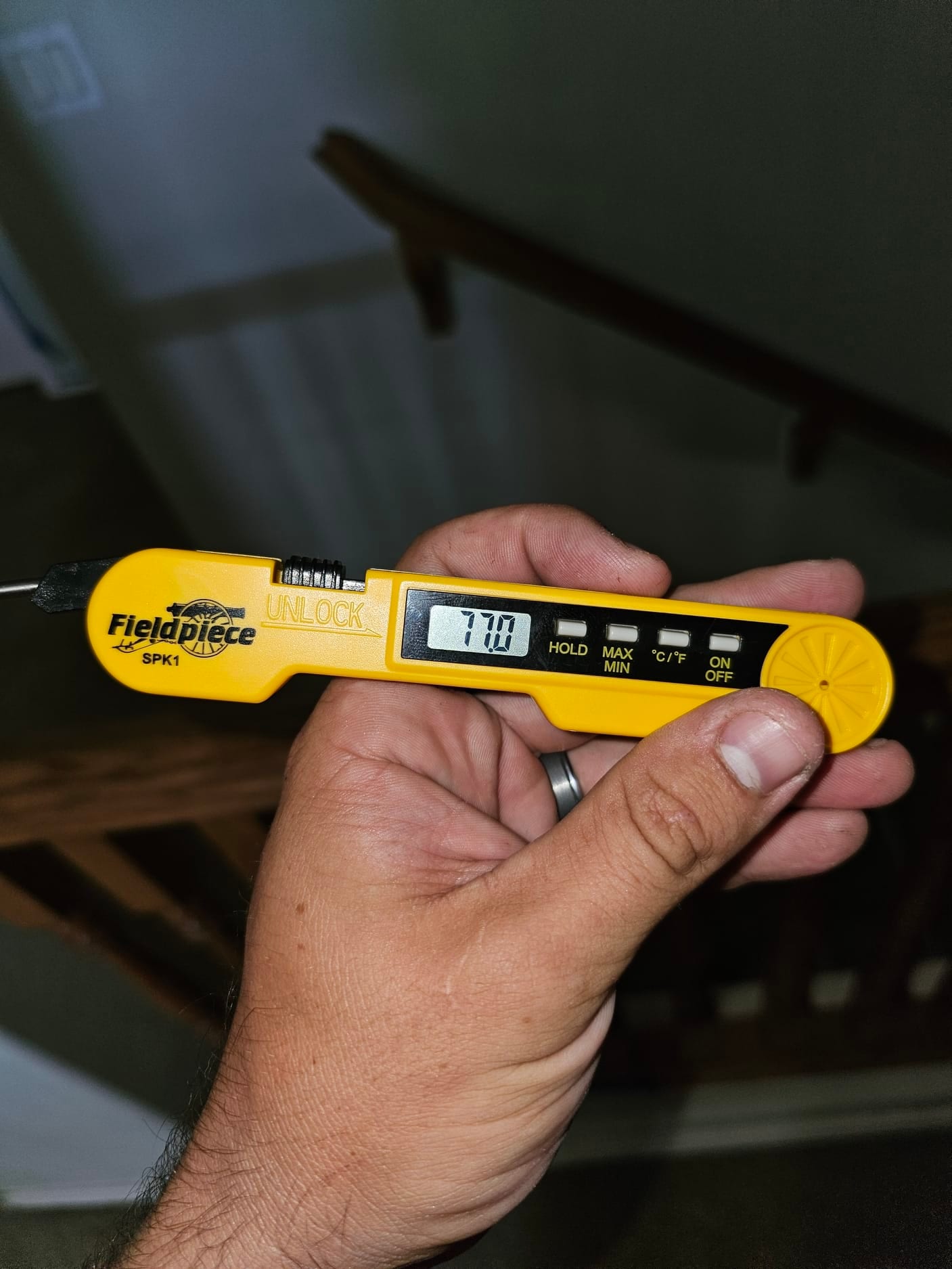 HVAC diagnostic instrument photographed during the service visit.