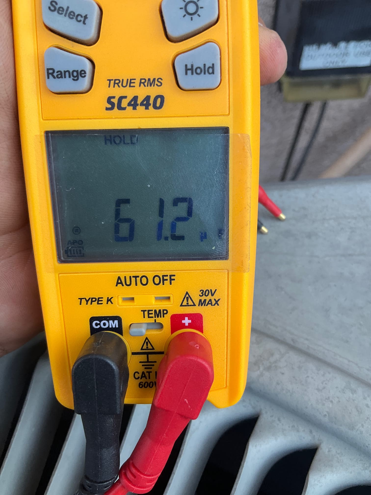 HVAC diagnostic instrument photographed during the service visit.