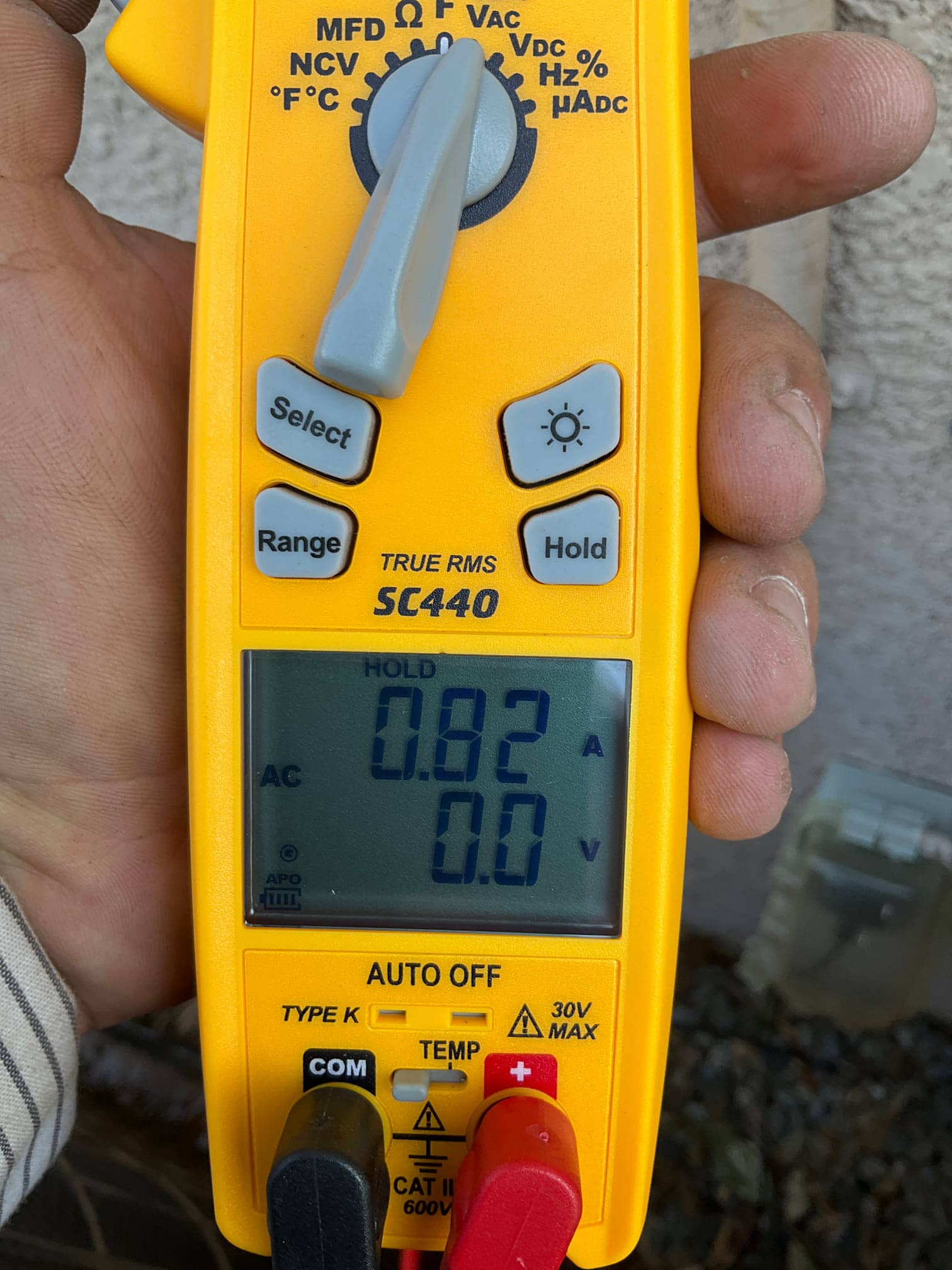 HVAC diagnostic instrument photographed during the service visit.