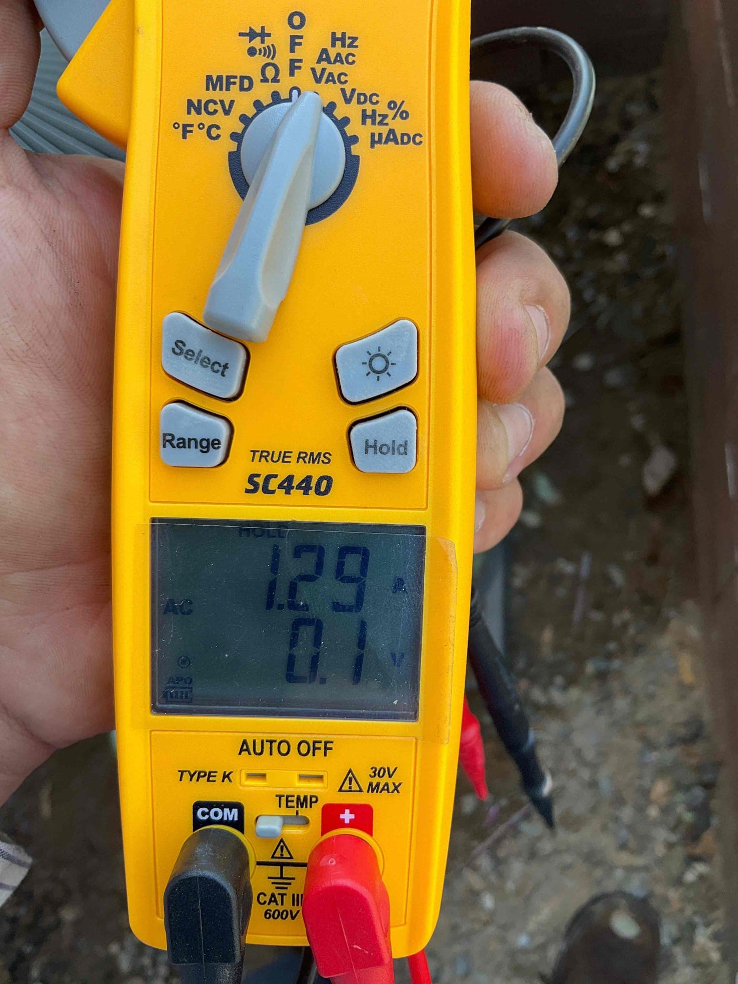 HVAC diagnostic instrument photographed during the service visit.