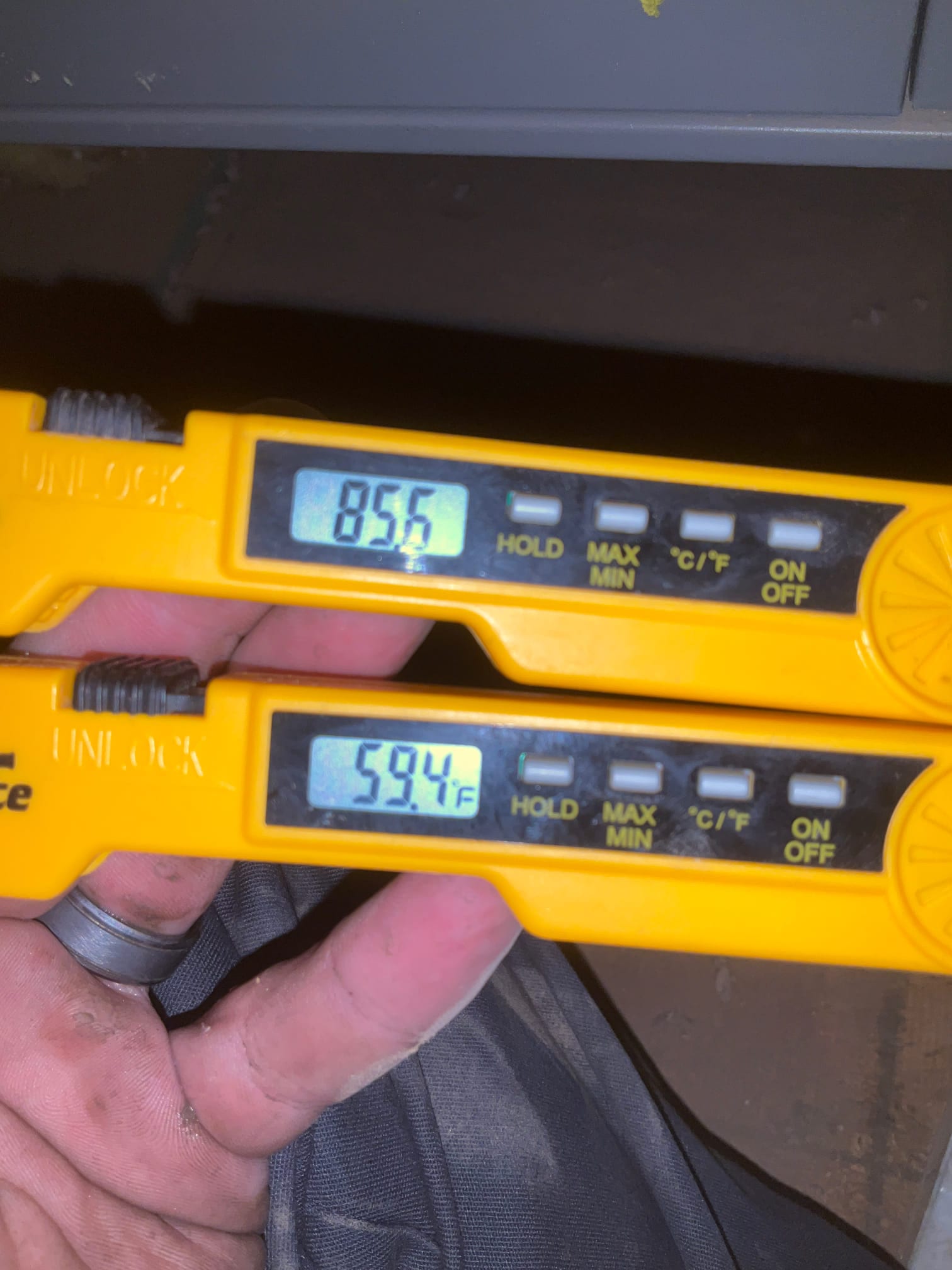 HVAC diagnostic instrument photographed during the service visit.