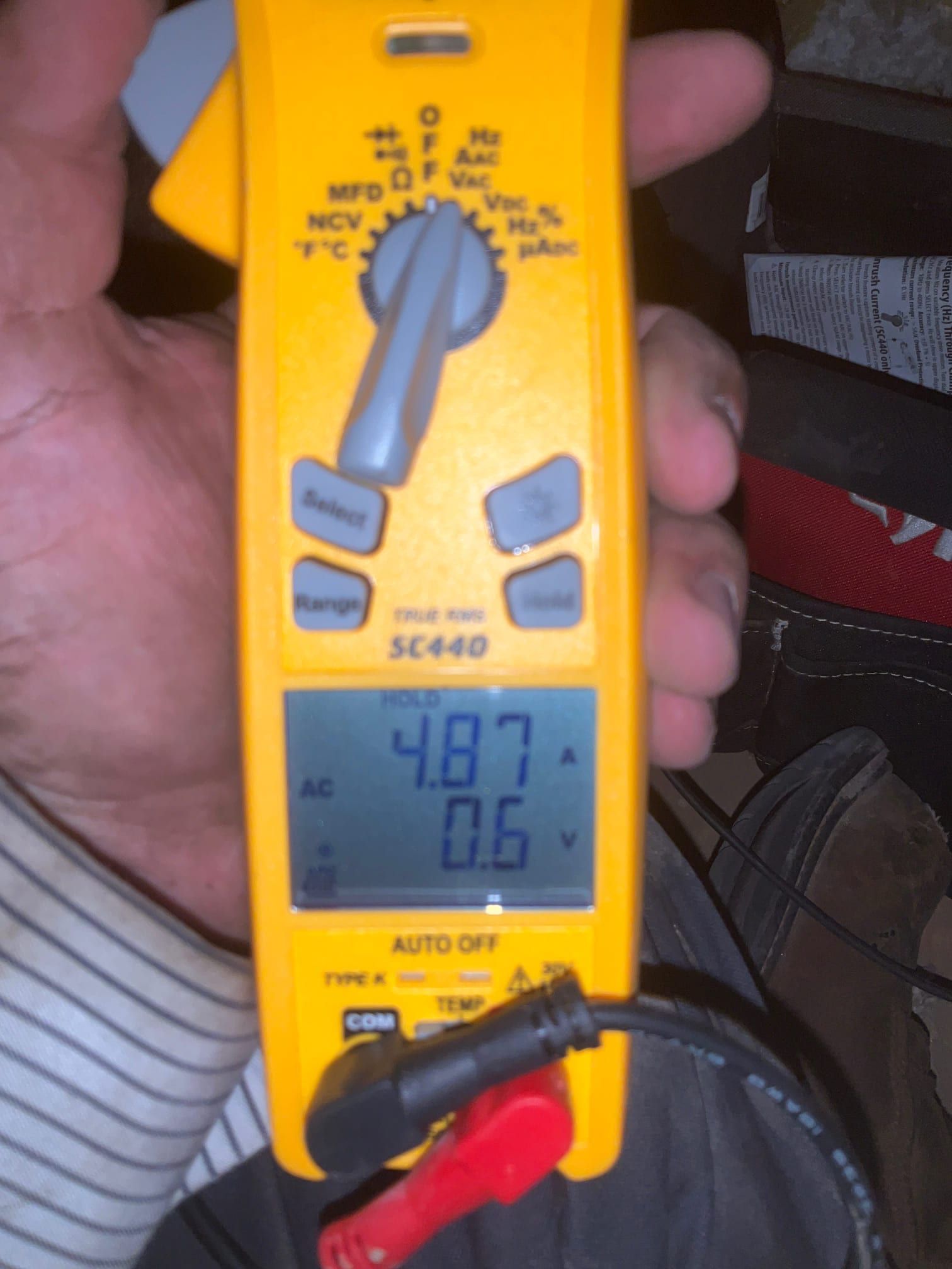 HVAC diagnostic instrument photographed during the service visit.