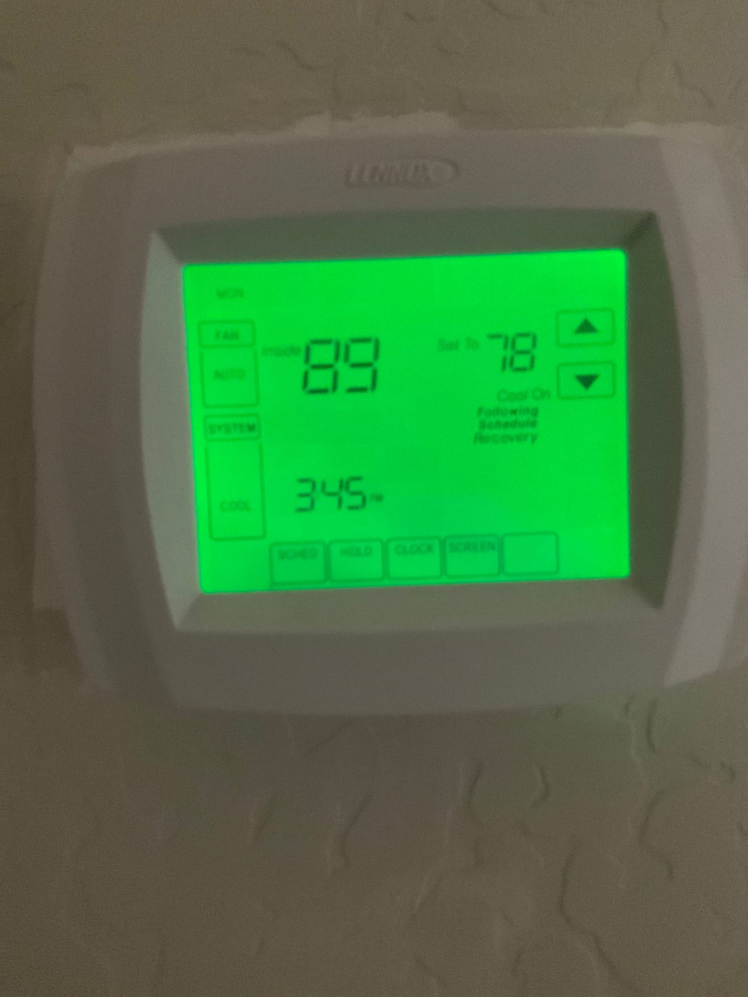 Wall-mounted thermostat display shows inside 89 and set to 78 with cooling mode indicated.