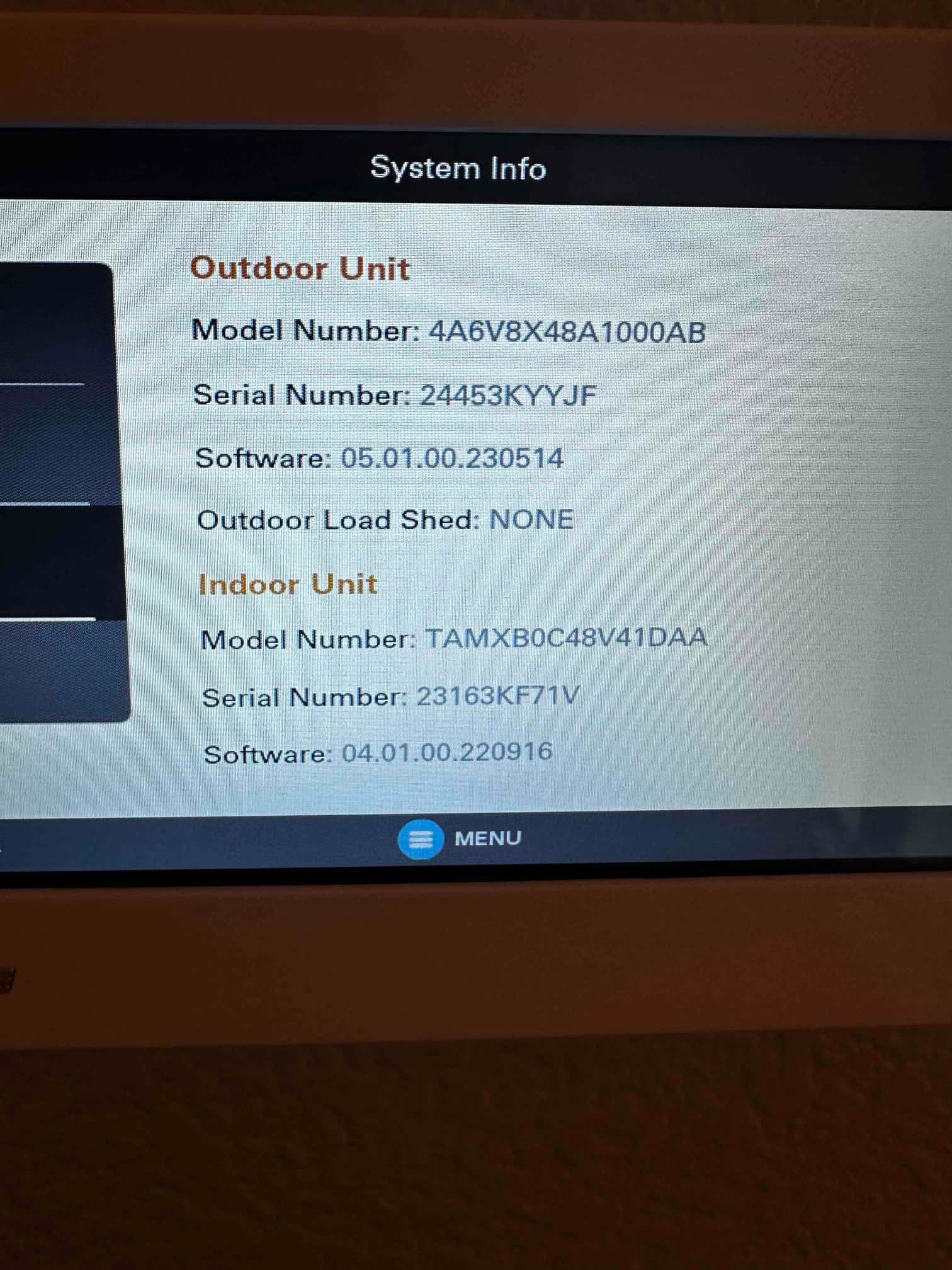 Thermostat screen displays system info for outdoor and indoor units, including model, serial numbers, and software versions.