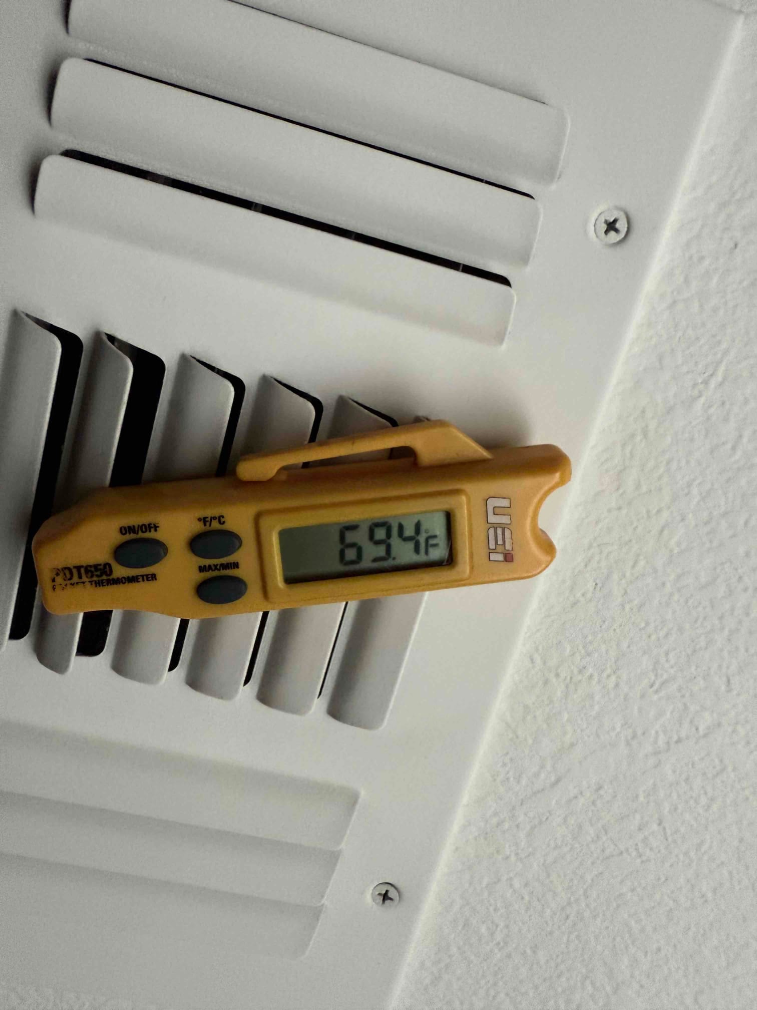 Diagnostic instrument display shows 69.4 °F.